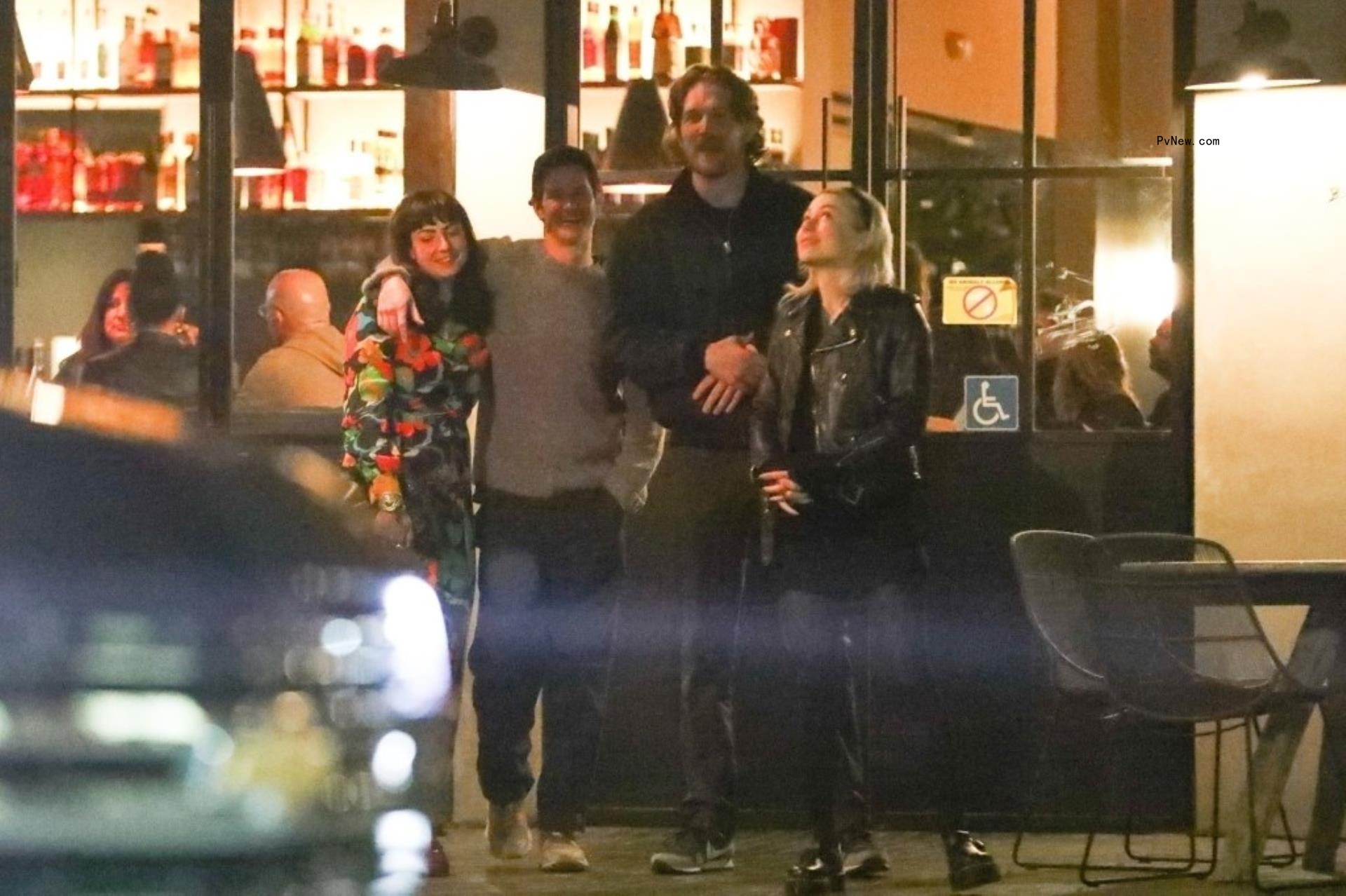 Garfield and Tomas embracing alo<i></i>ngside Bo Burnham and Phoebe Bridgers