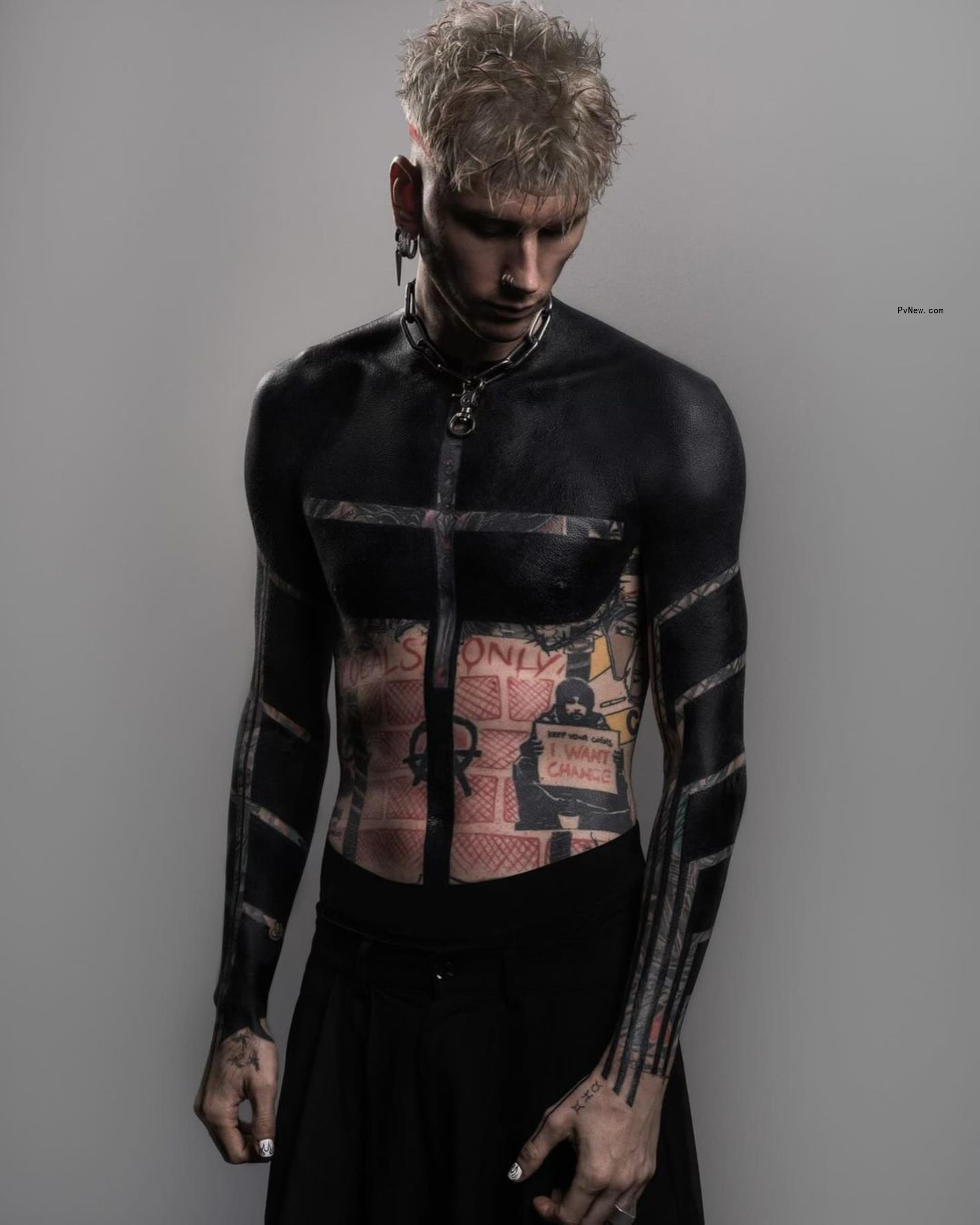 MGK with his blackout tattoo