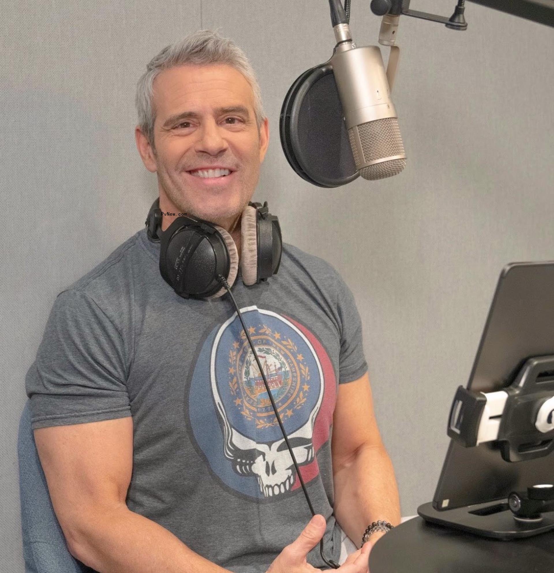 Andy Cohen talking into a microphone 