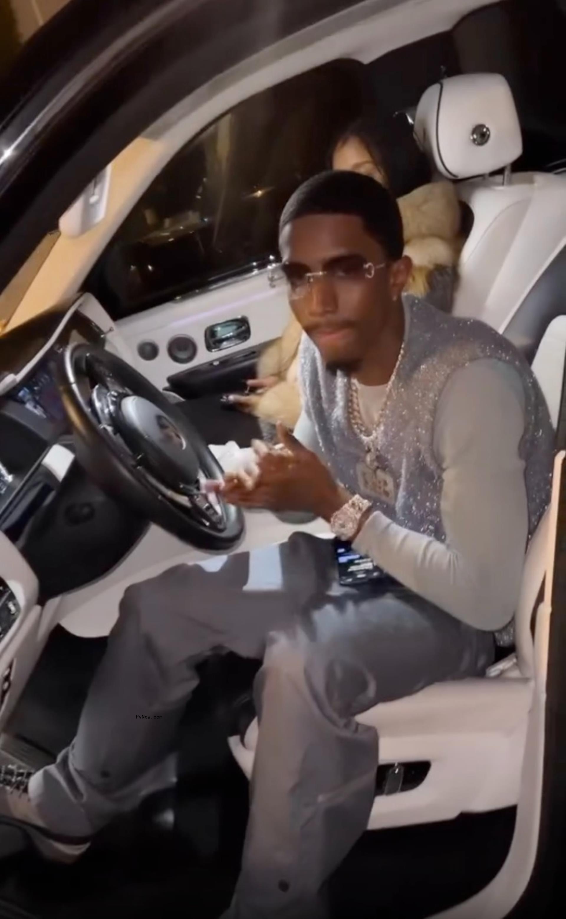 christian combs sitting in a car