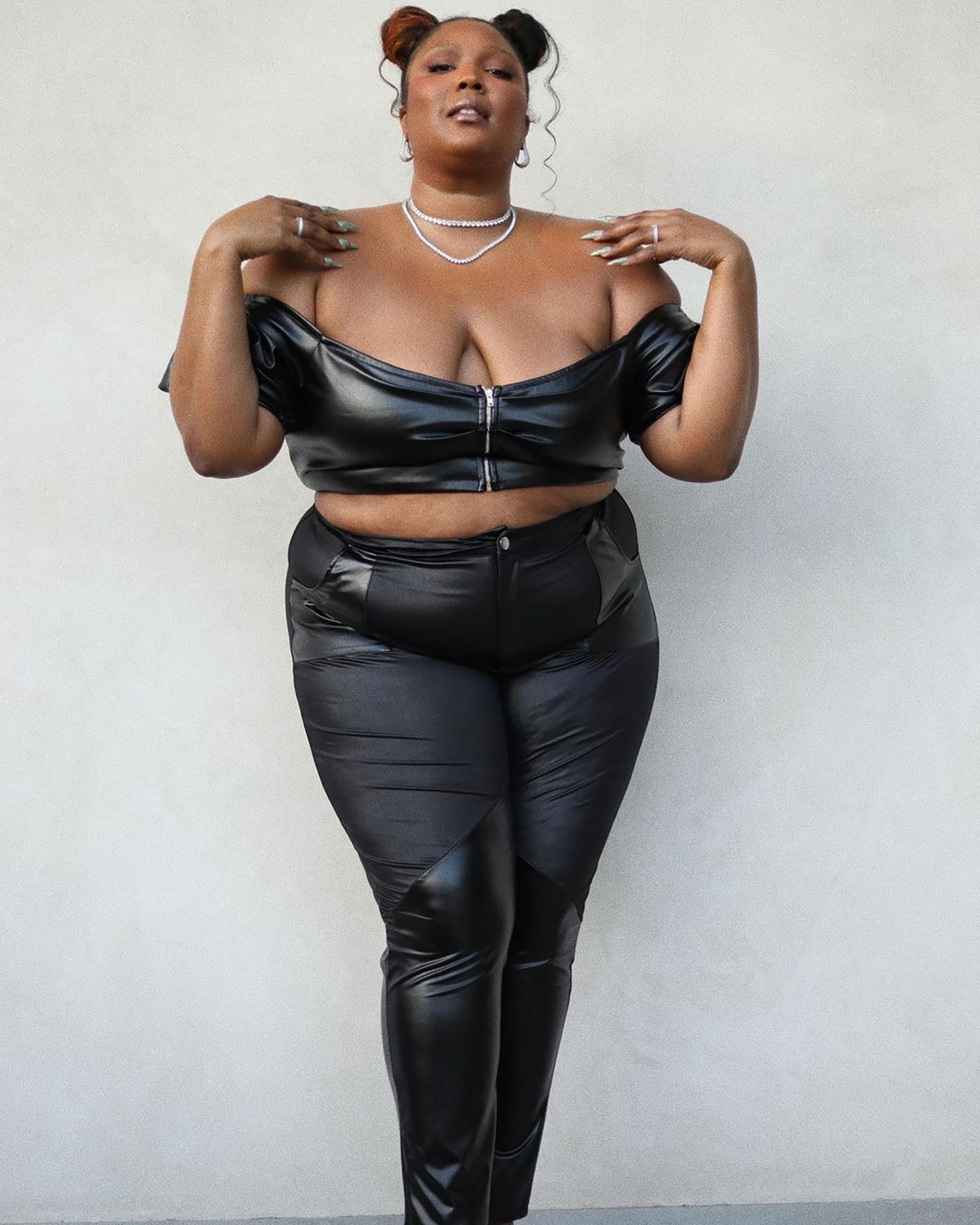 Lizzo in black latex.