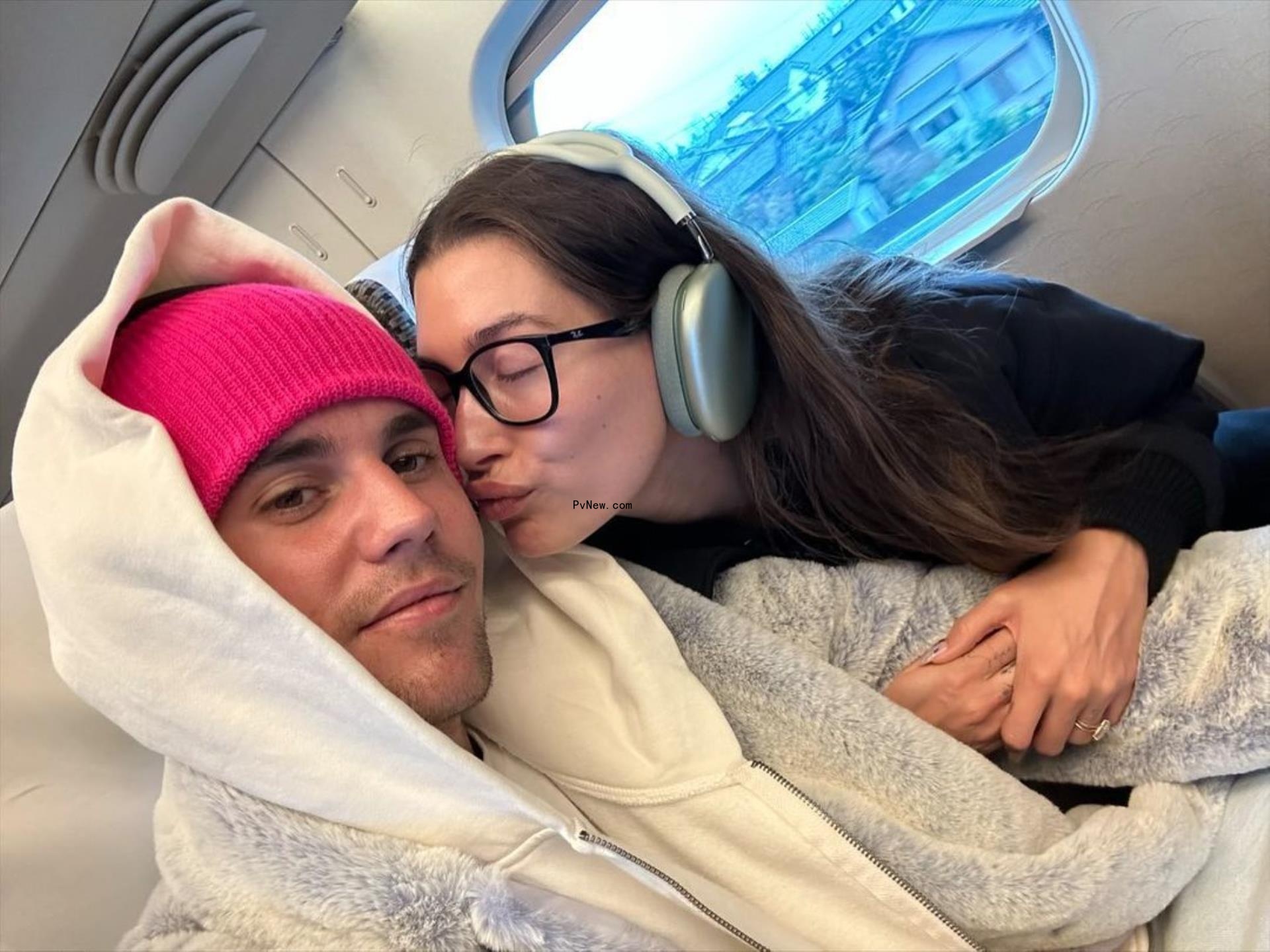 Hailey Bieber and Justin Bieber on a plane.
