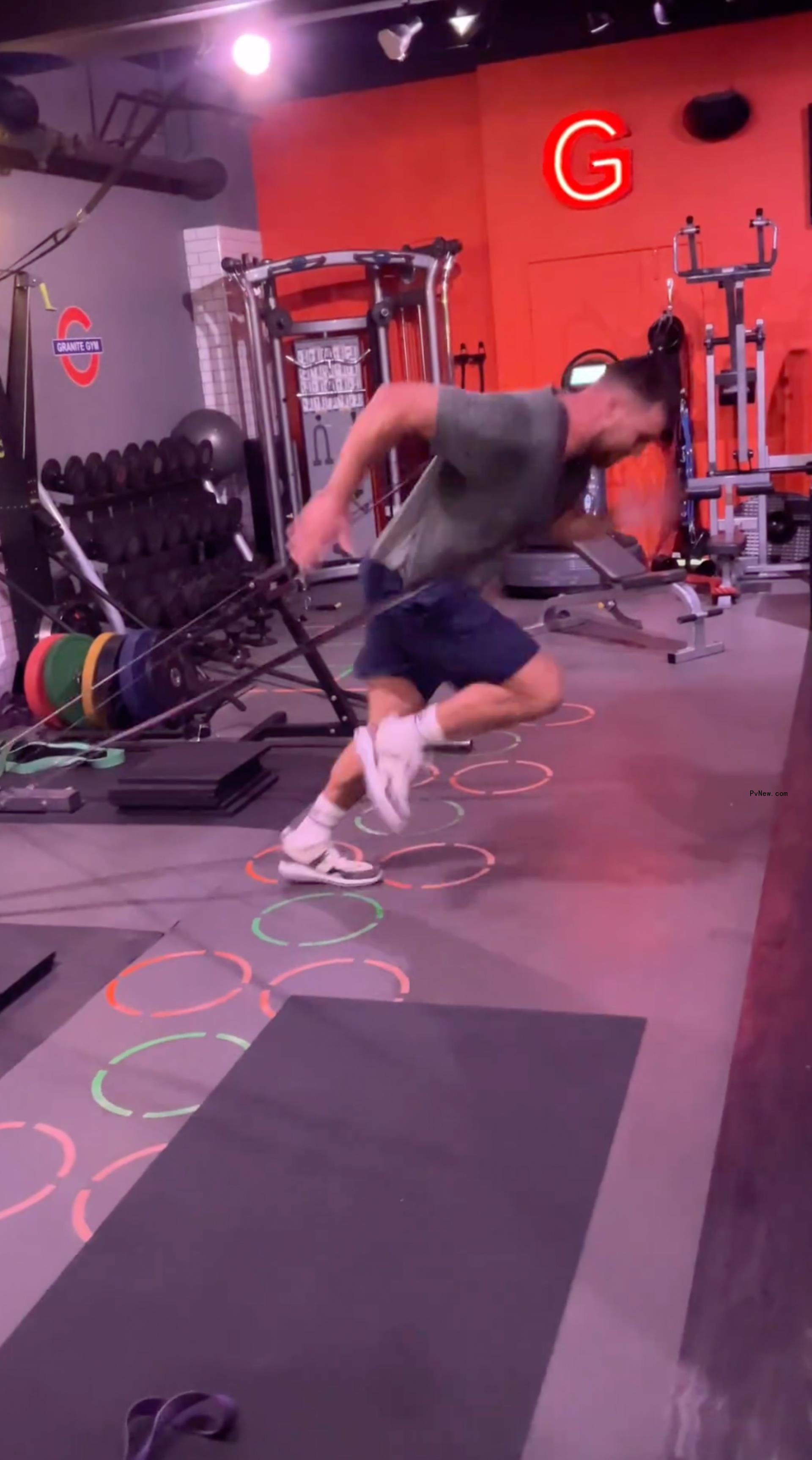 Travis Kelce working out.