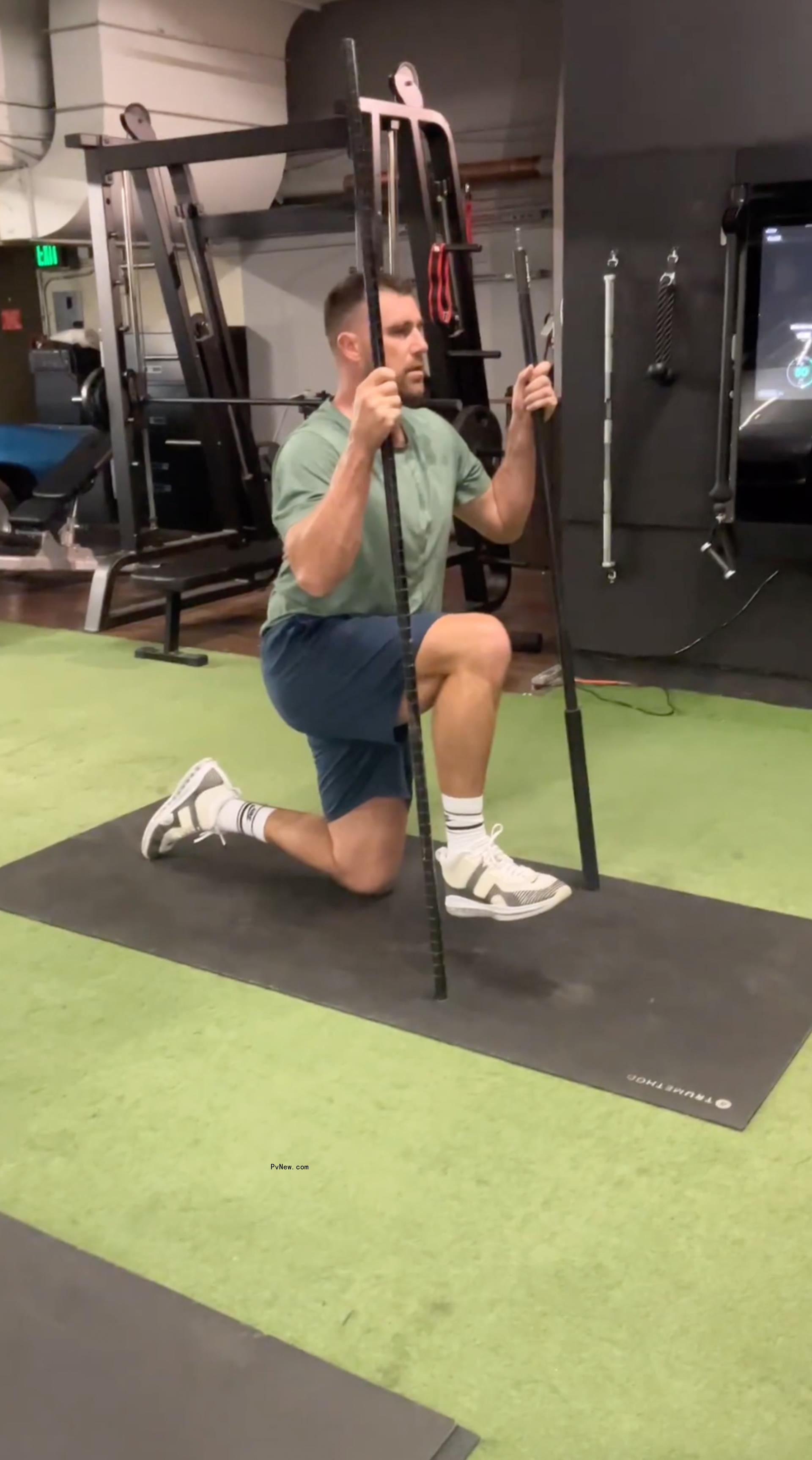 Travis Kelce working out.