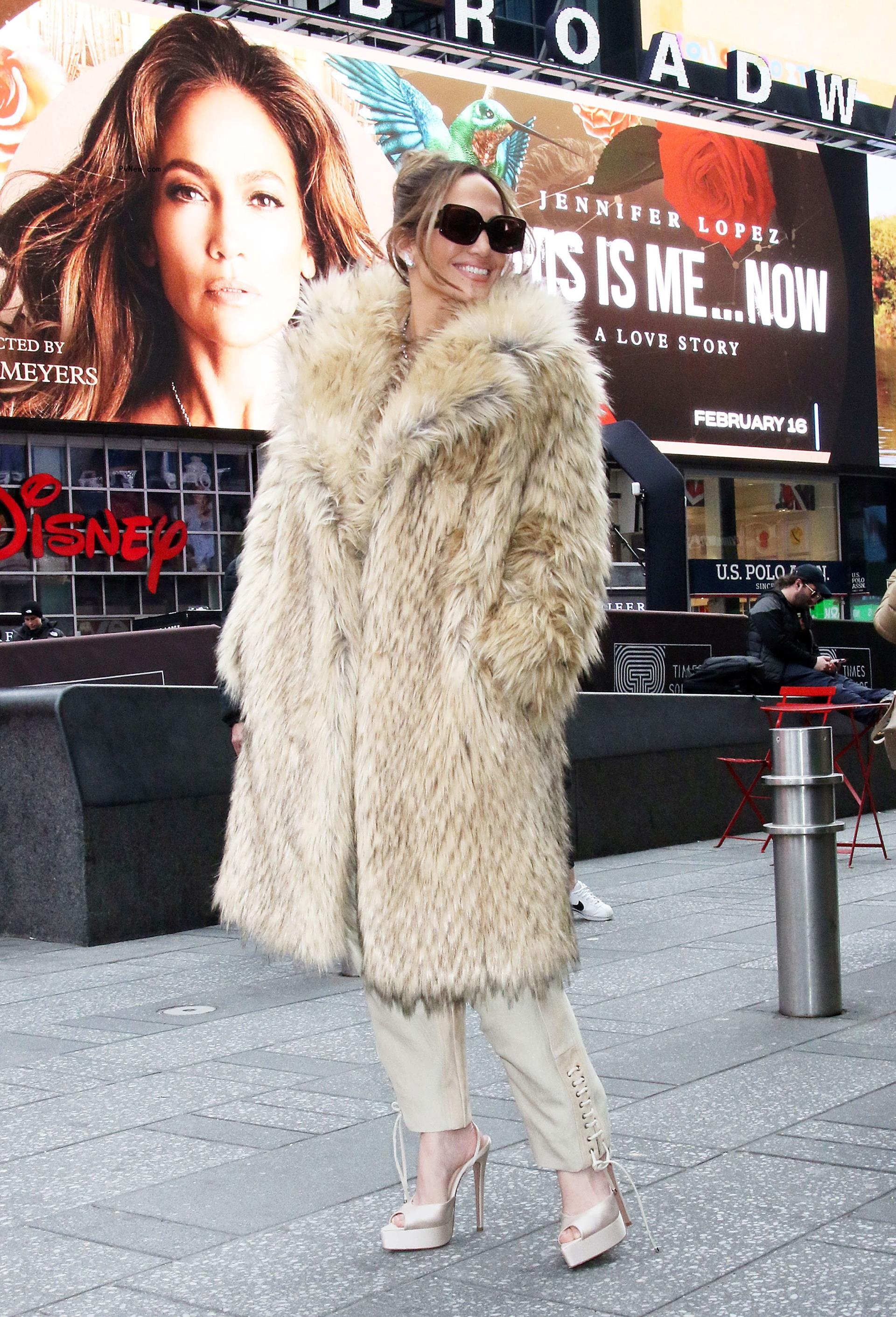 Jennifer Lopez in a fur coat.