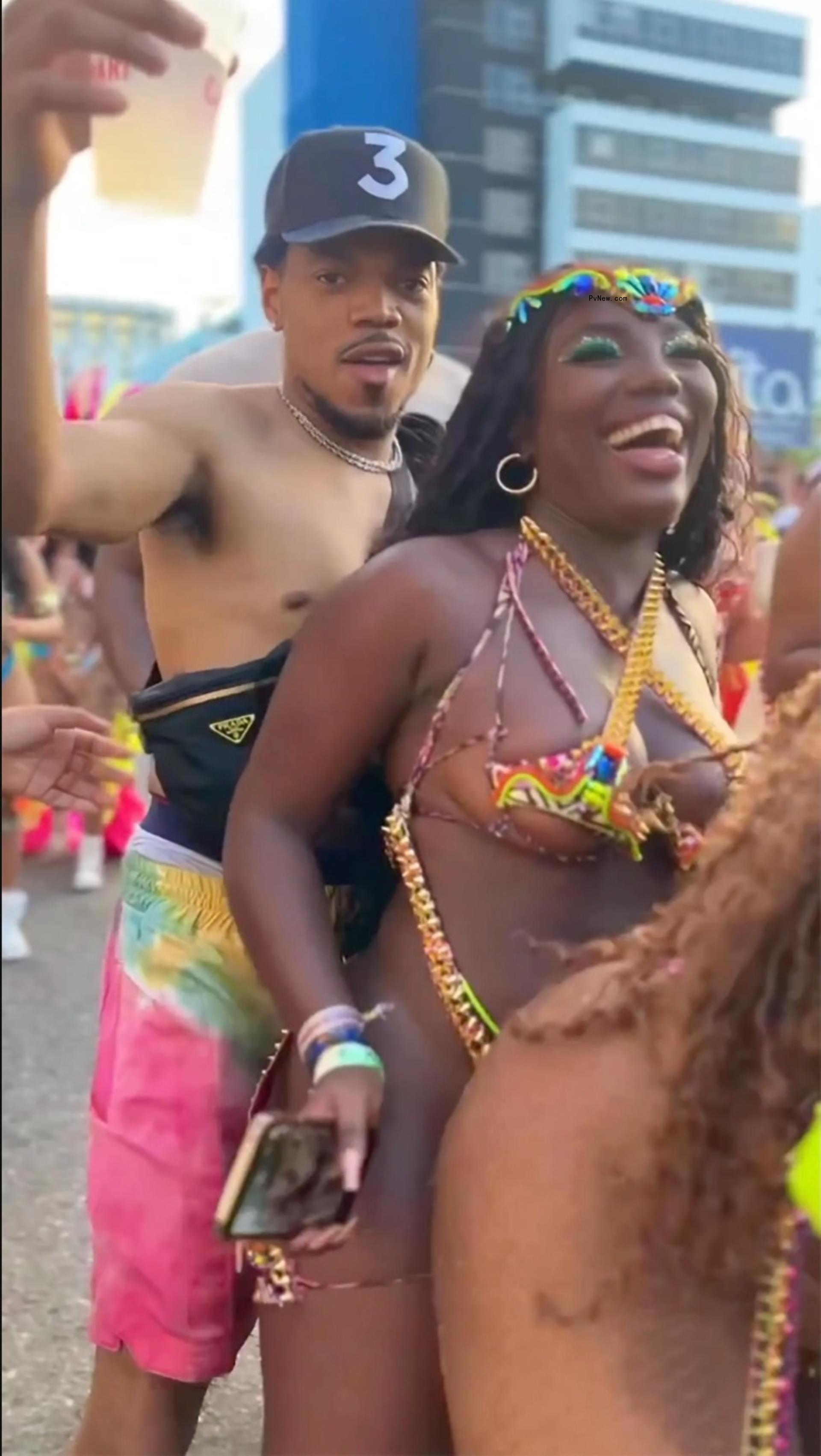 Chance the Rapper dancing with a woman.