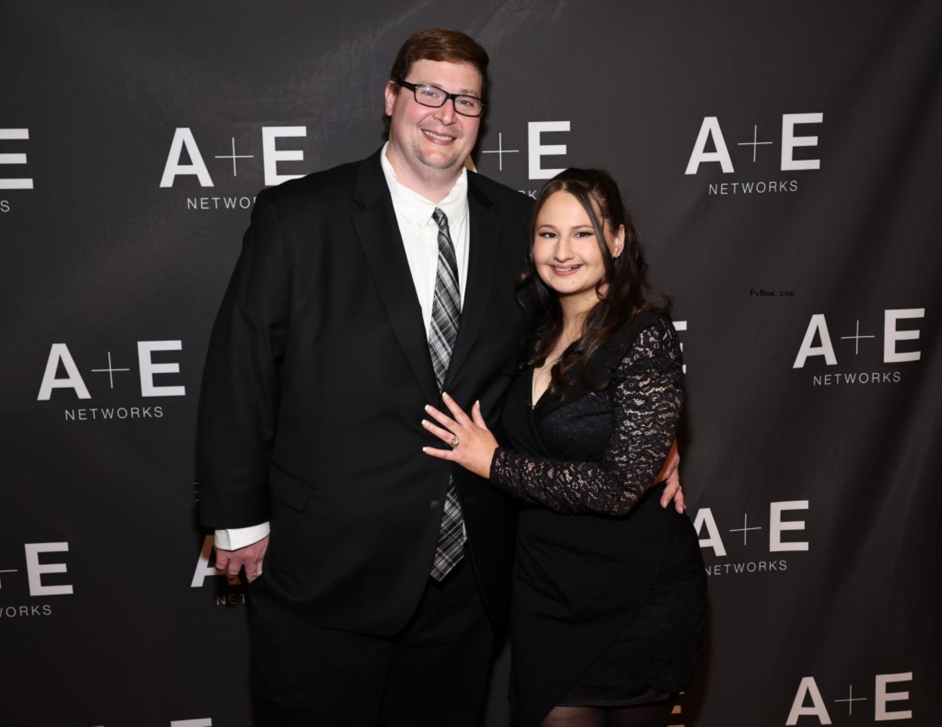 Ryan Scott Anderson and Gyspy Rose Blanchard on a red carpet. 