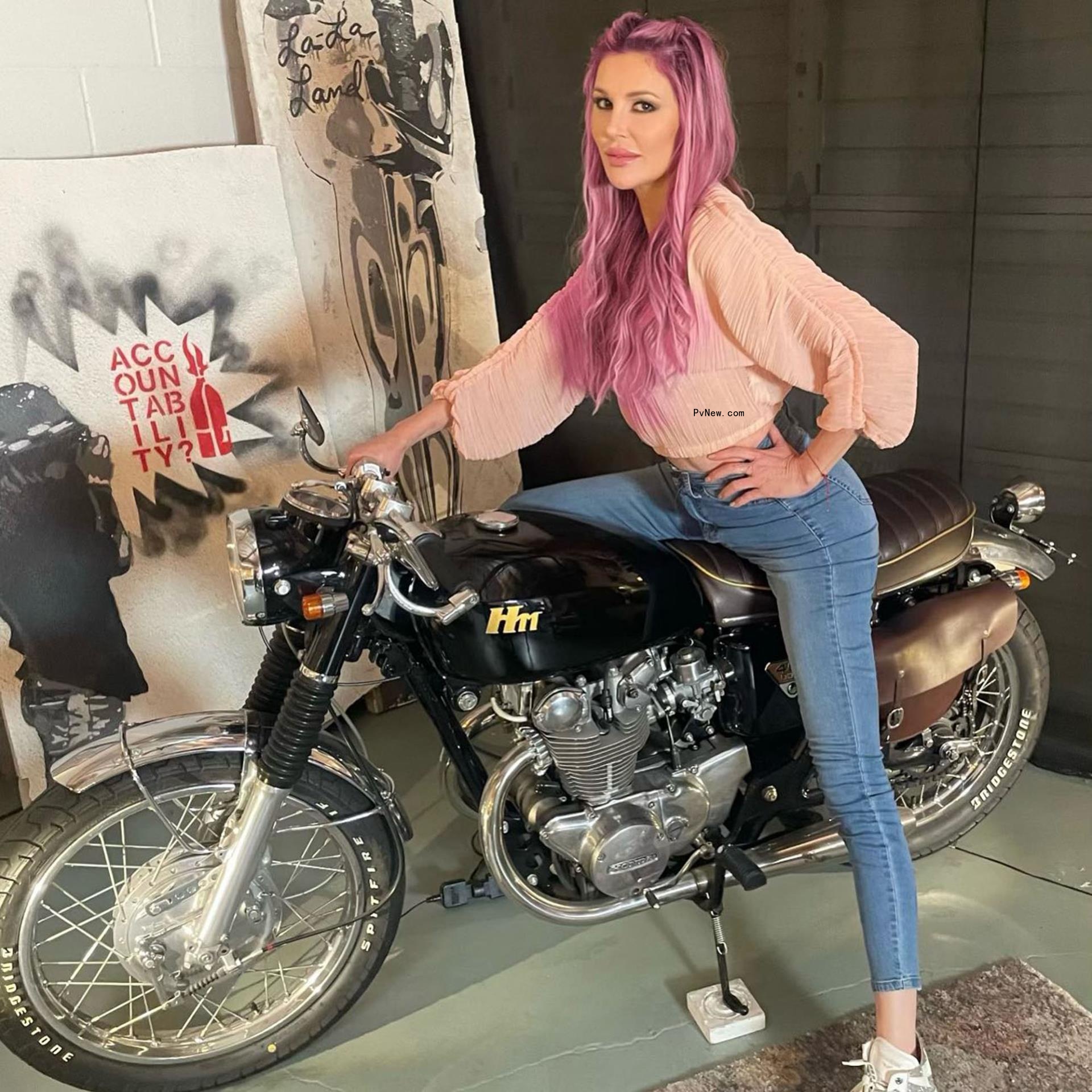 brandi glanville on a motorcycle