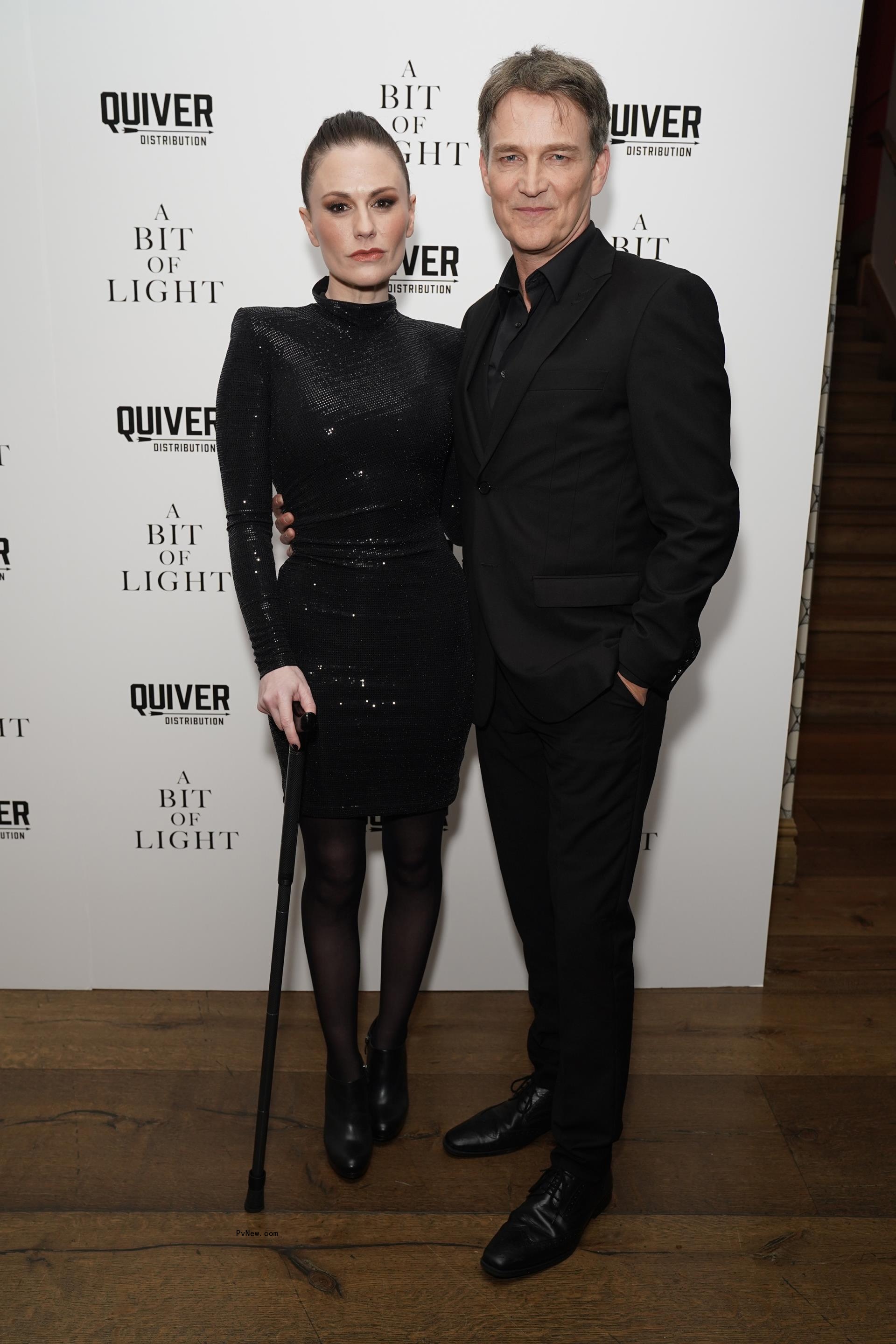 Anna Paquin, Stephen Moyer posing together 