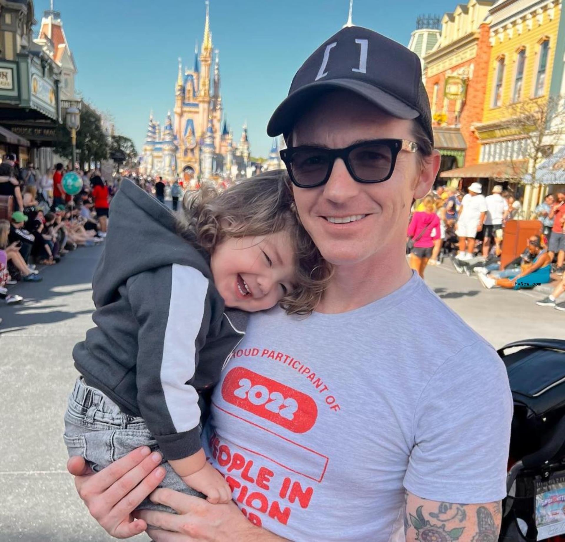 drake bell and his baby on the couch