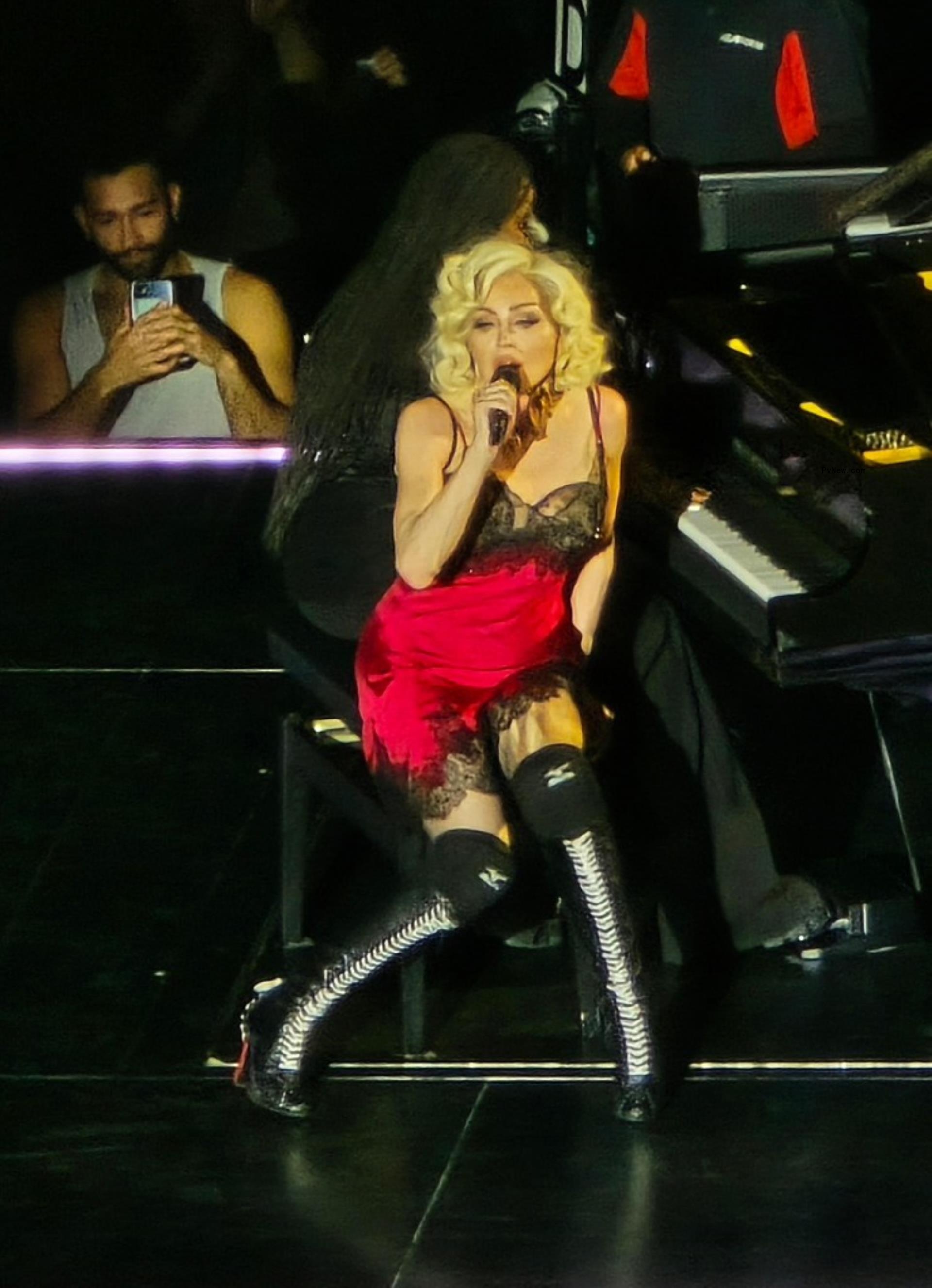 Mado<i></i>nna performing on stage