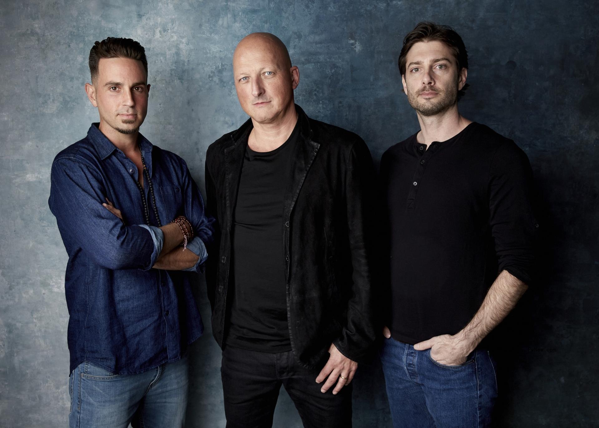 Wade Robson, from left, director Dan Reed and James Safechuck pose 