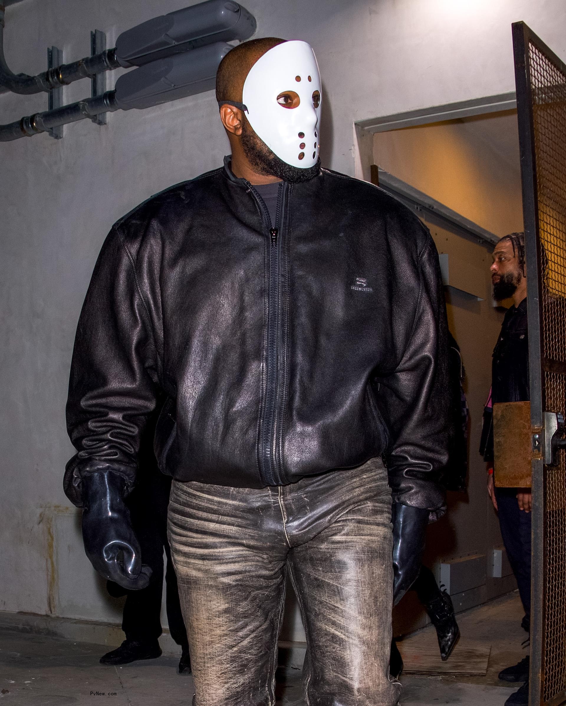 Kanye West with a face mask.