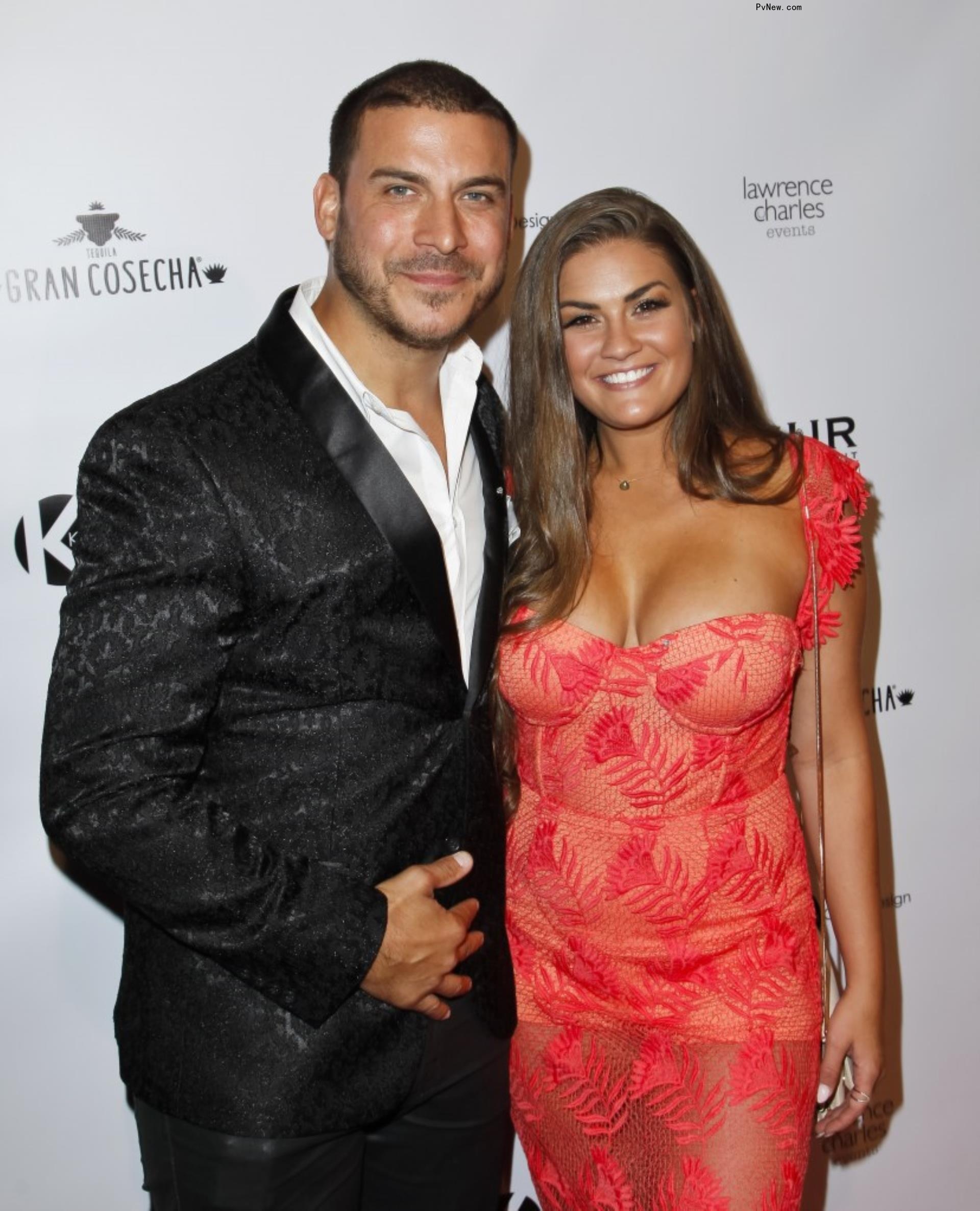 Jax Taylor and Brittany Cartwright on a red carpet. 
