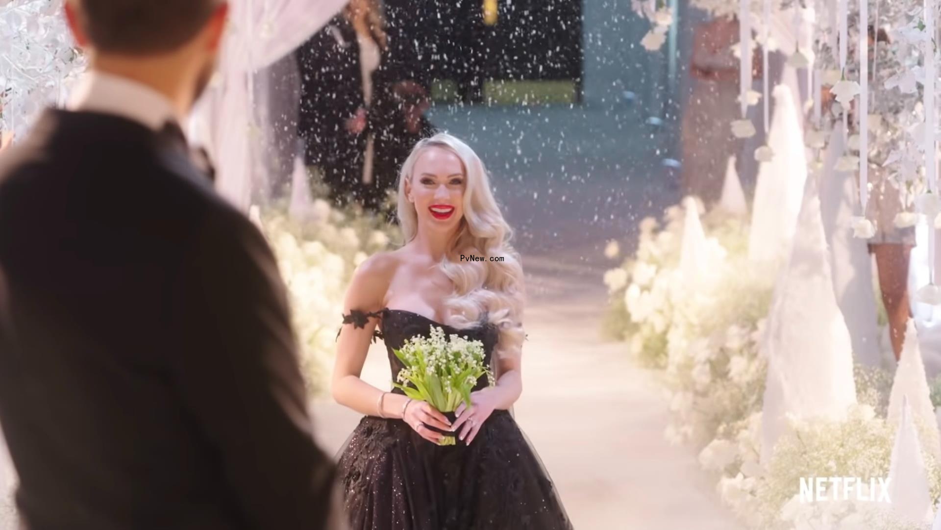 Christine Quinn walking down the aisle.