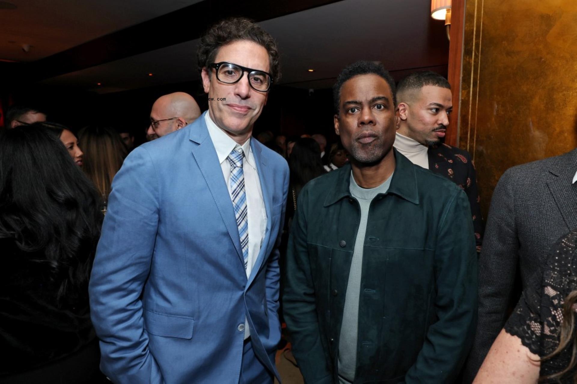 Sacha Baron Cohen poses with Chris Rock.