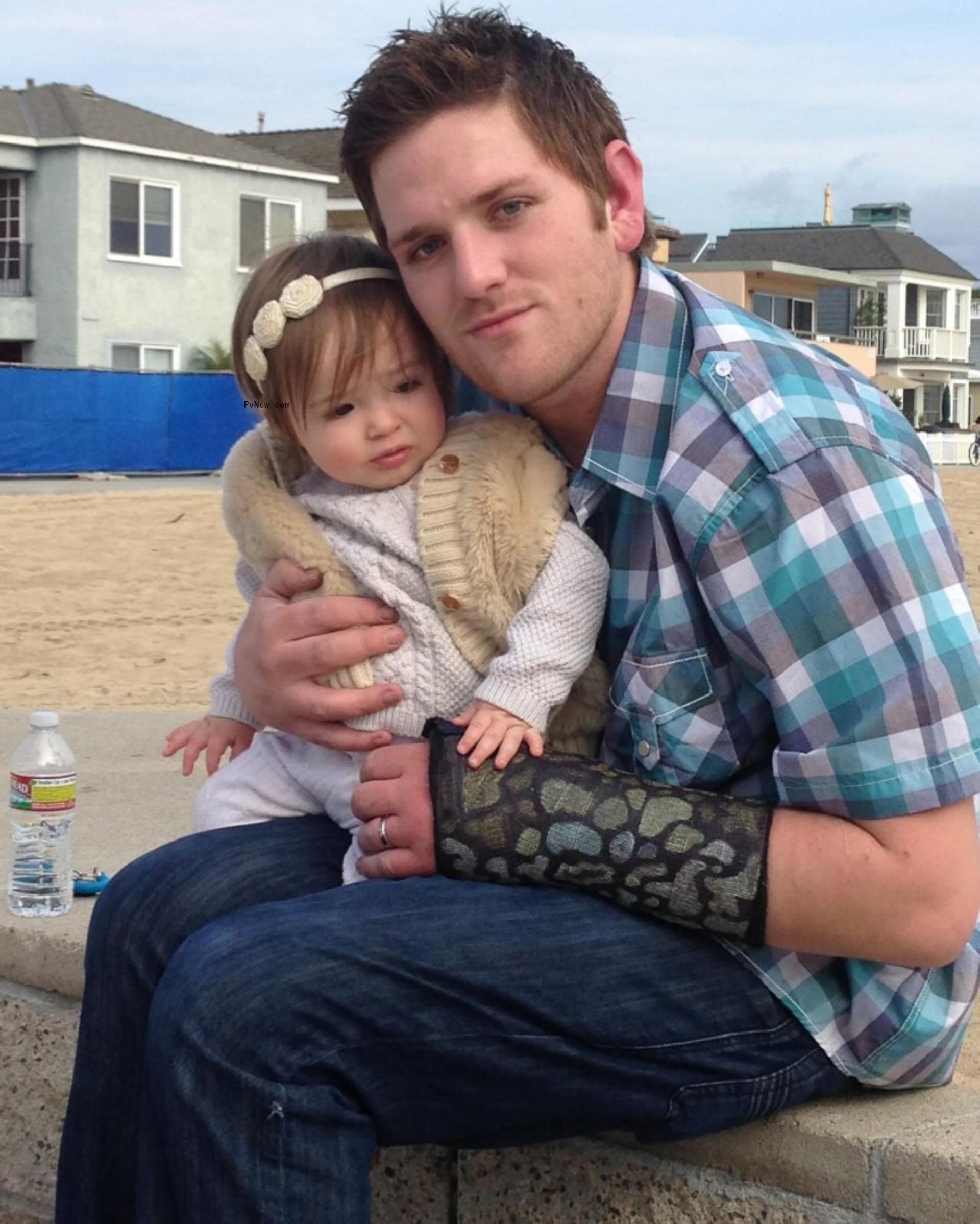  Lauri Peterson's son Josh and his daughter