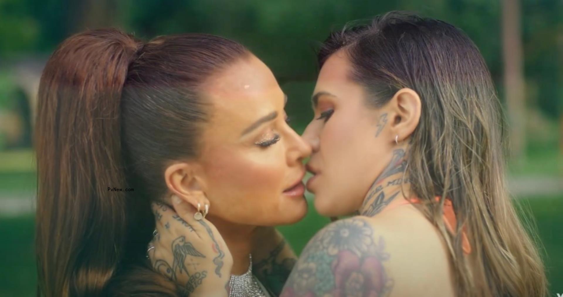 kyle richards and morgan wade a<i></i>bout to kiss in a music video