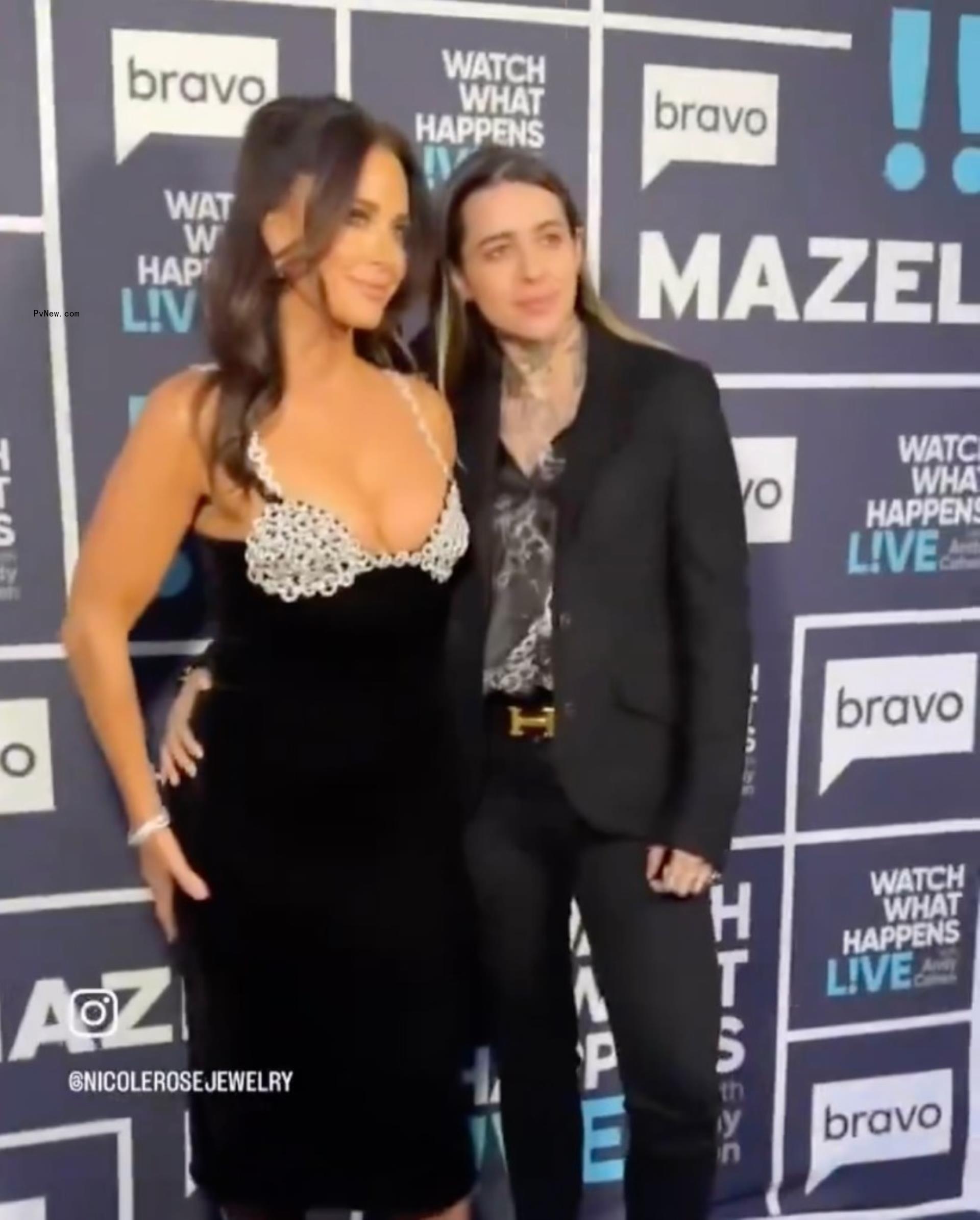 morgan wade with her arm wrapped around kyle richards' butt