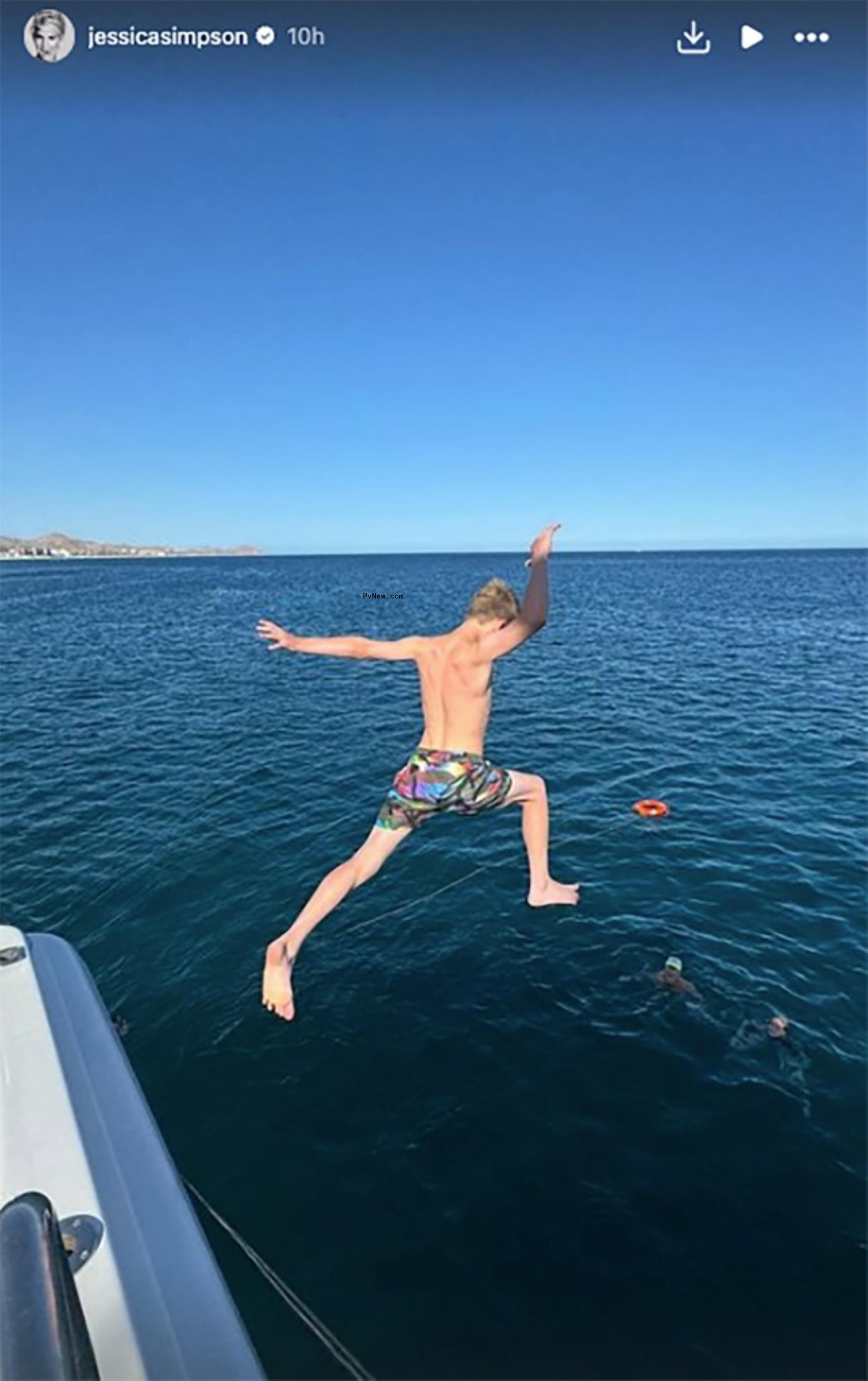 Ace jumping into the water in Cabo San Lucas, Mexico.