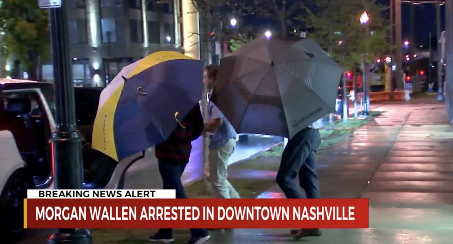 Morgan Wallen being taken by police.