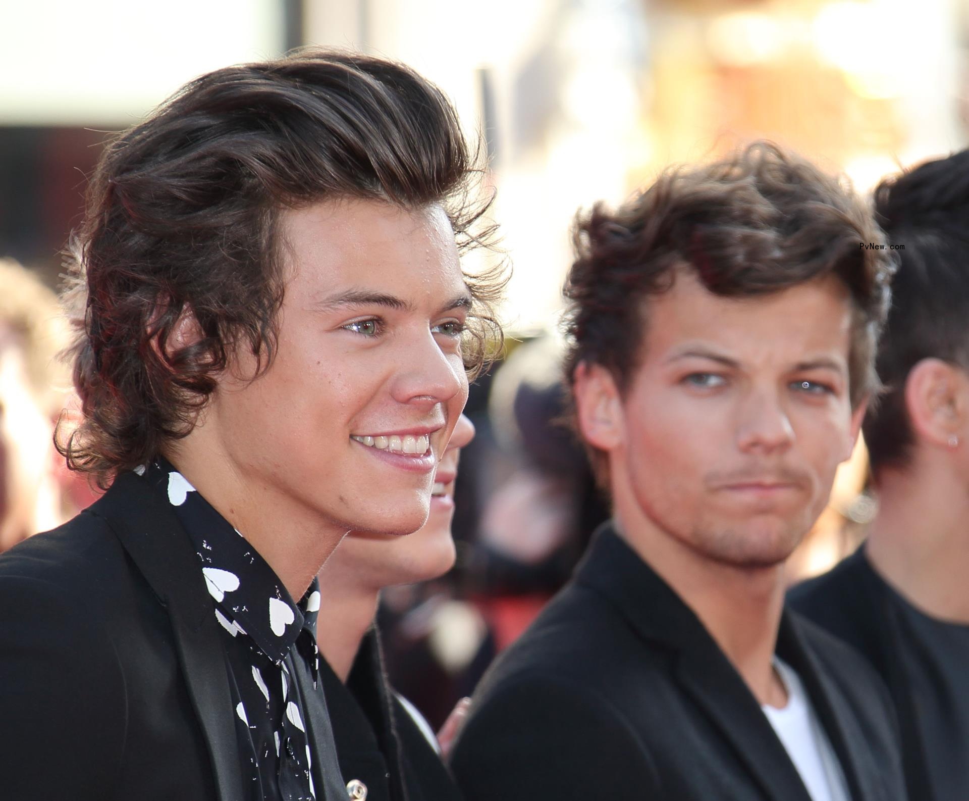 Louis Tomlinson and Harry Styles