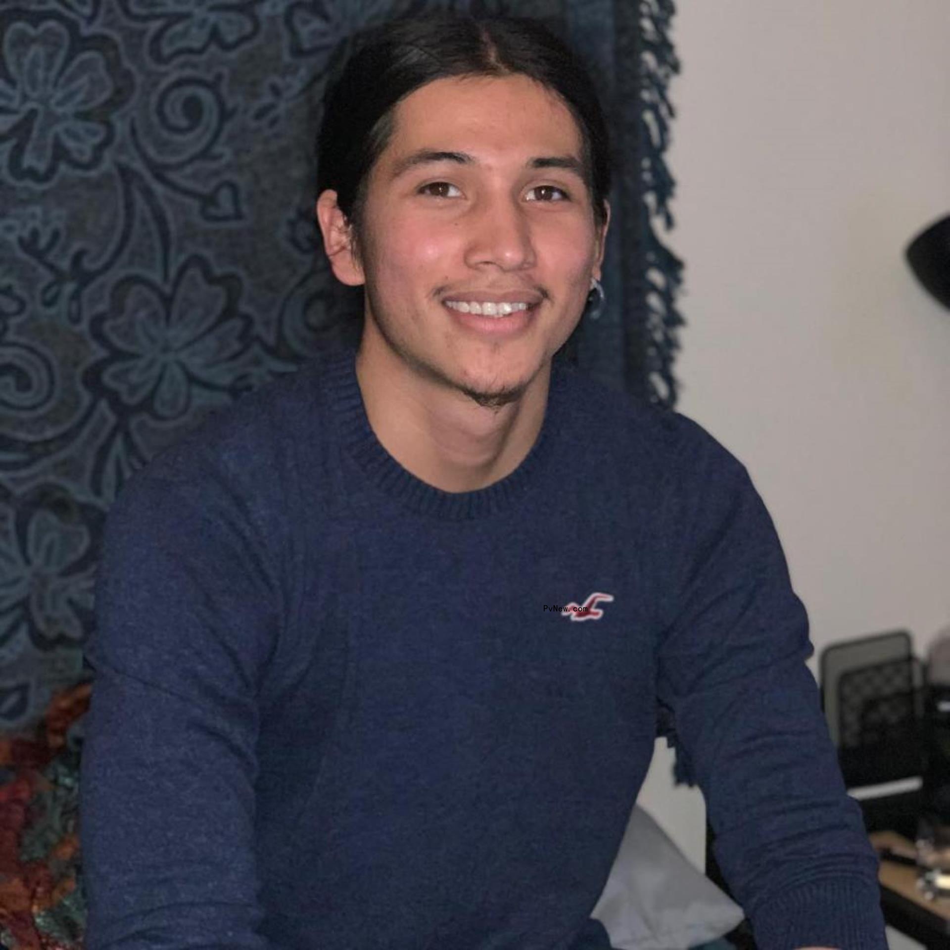 Cole Brings Plenty smiling