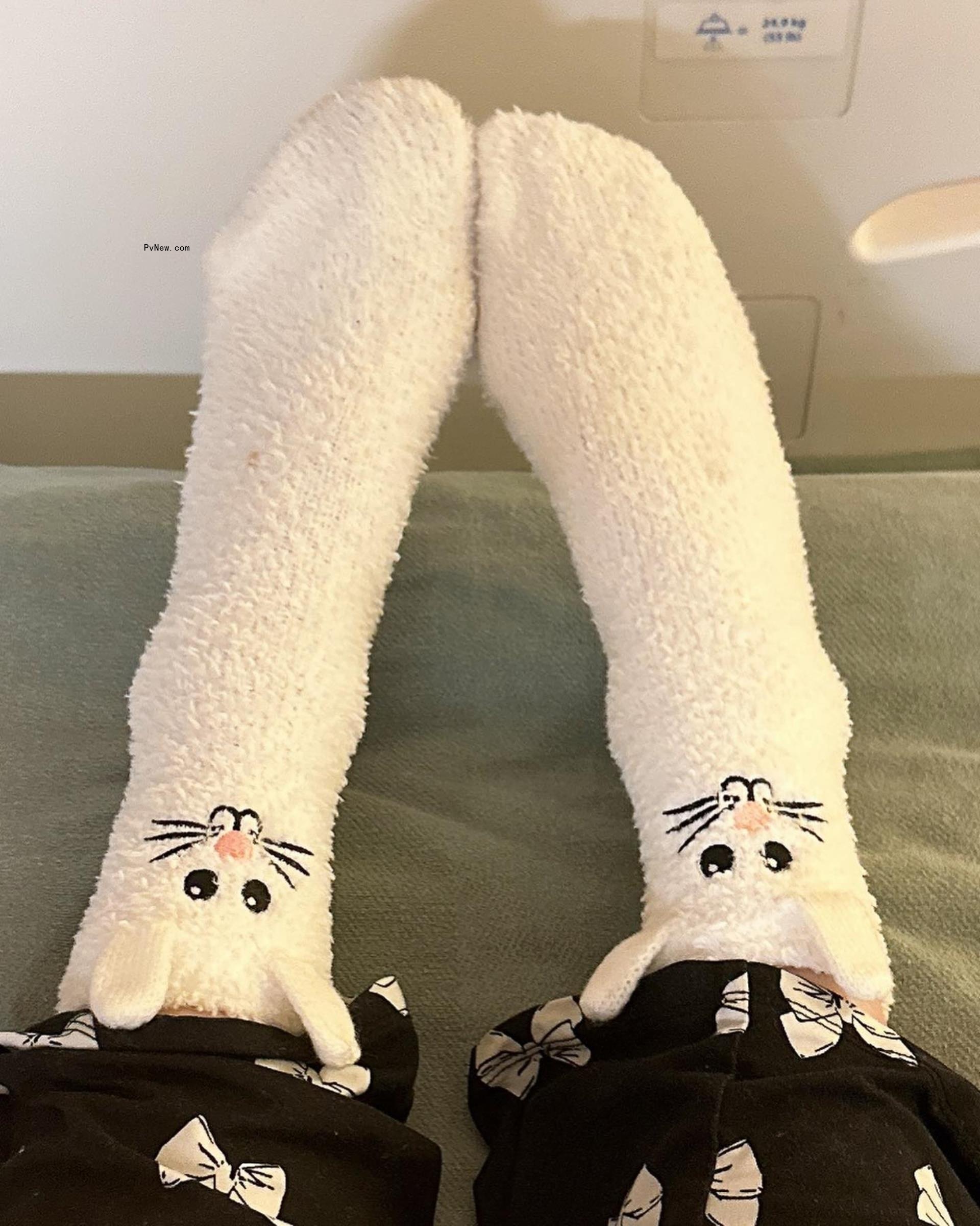 Kate Beckinsale in hospital bed with Easter socks