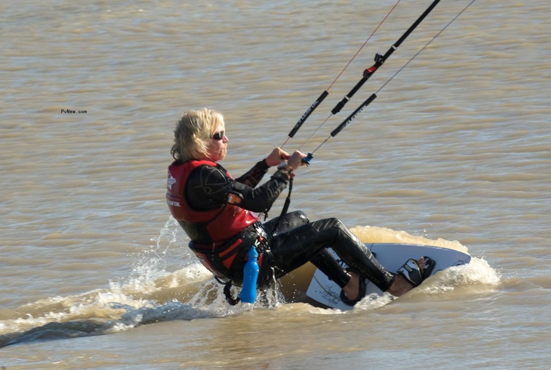 Richard Brandson kite surfing.