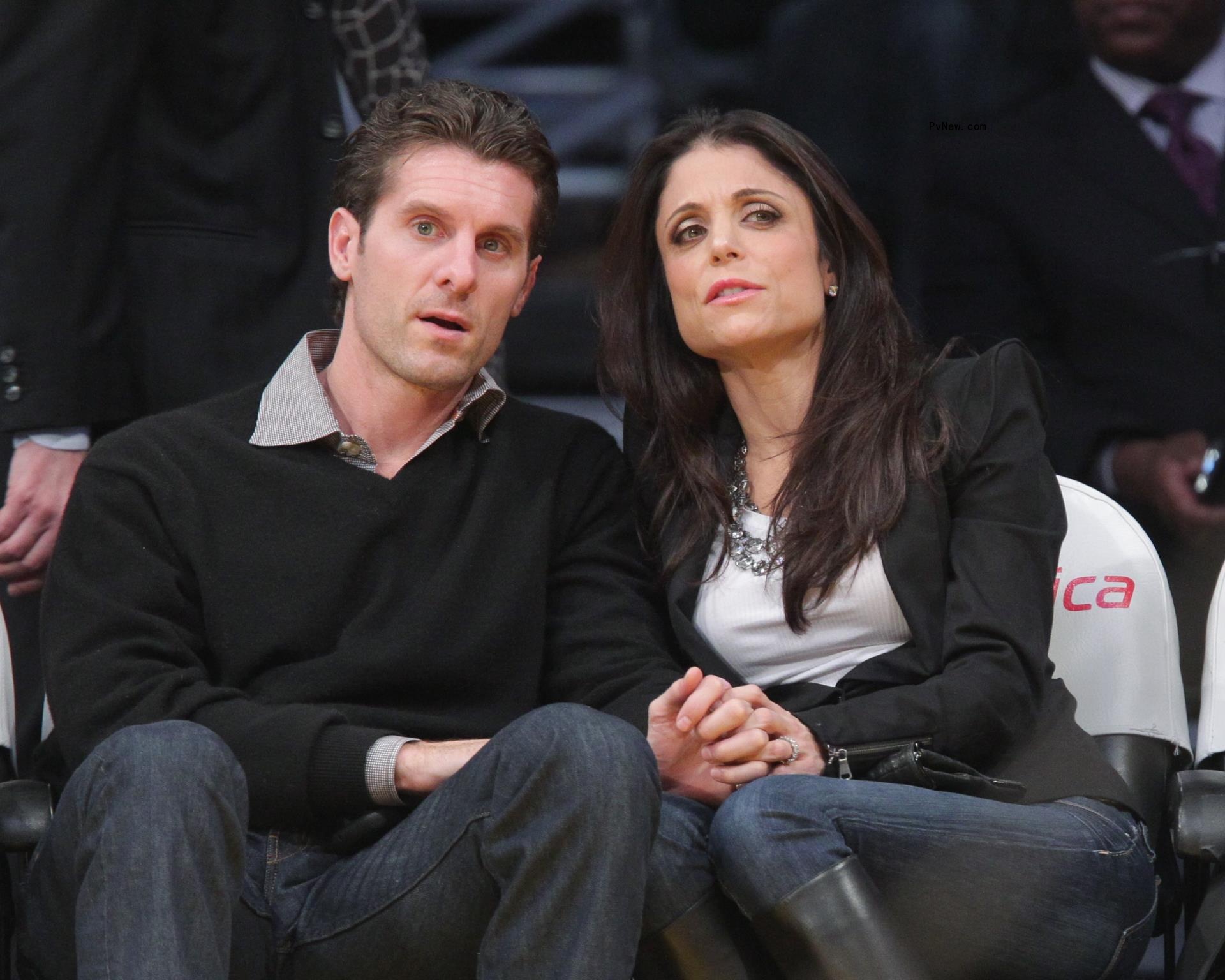 Jason Hoppy sitting with Bethenny Frankel