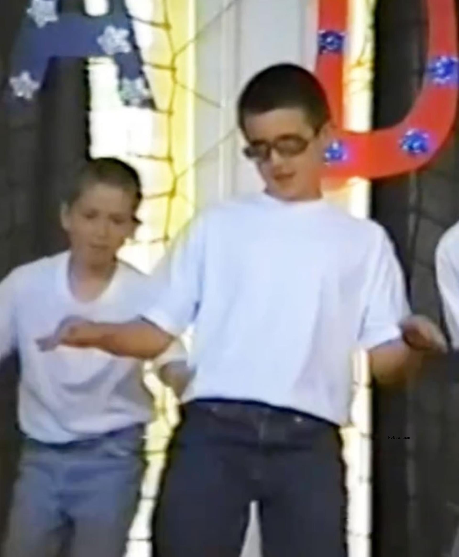 Travis and Jason Kelce playing sports as kids.