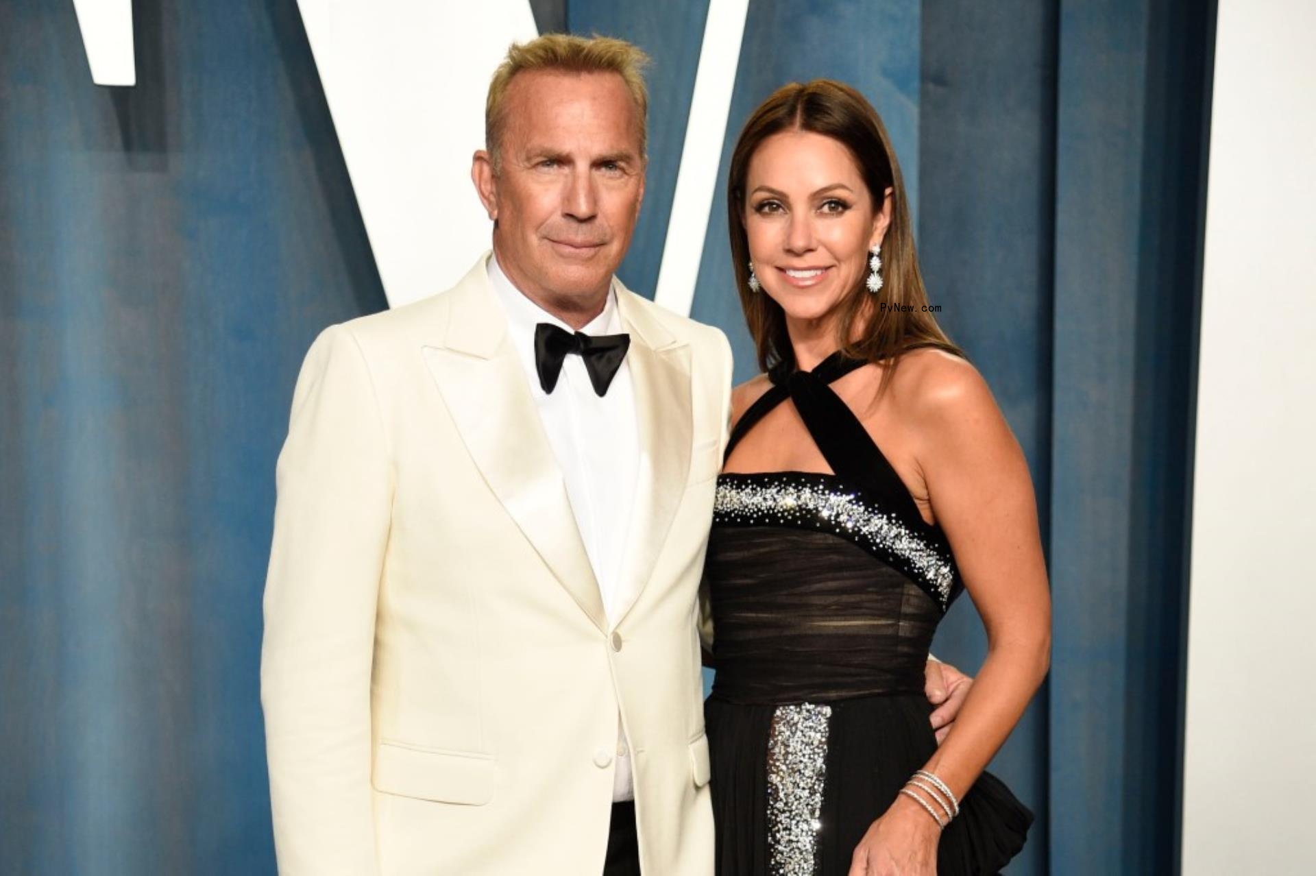 Kevin Costner, left, and Christine Baumgartner