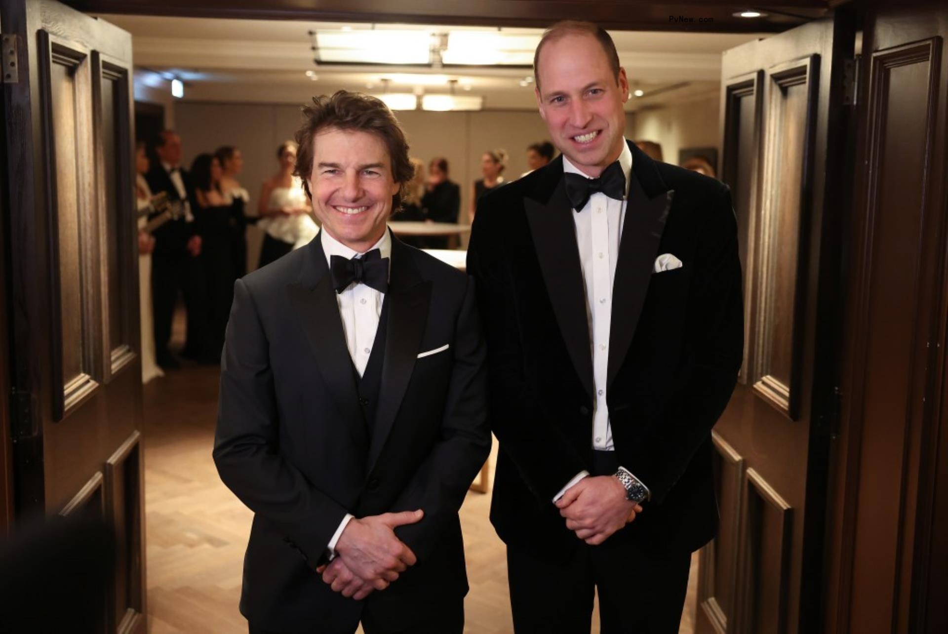 Prince William and Tom Cruise pose for photos at the Lo<i></i>ndon Air Ambulance Charity Gala Dinner in February.