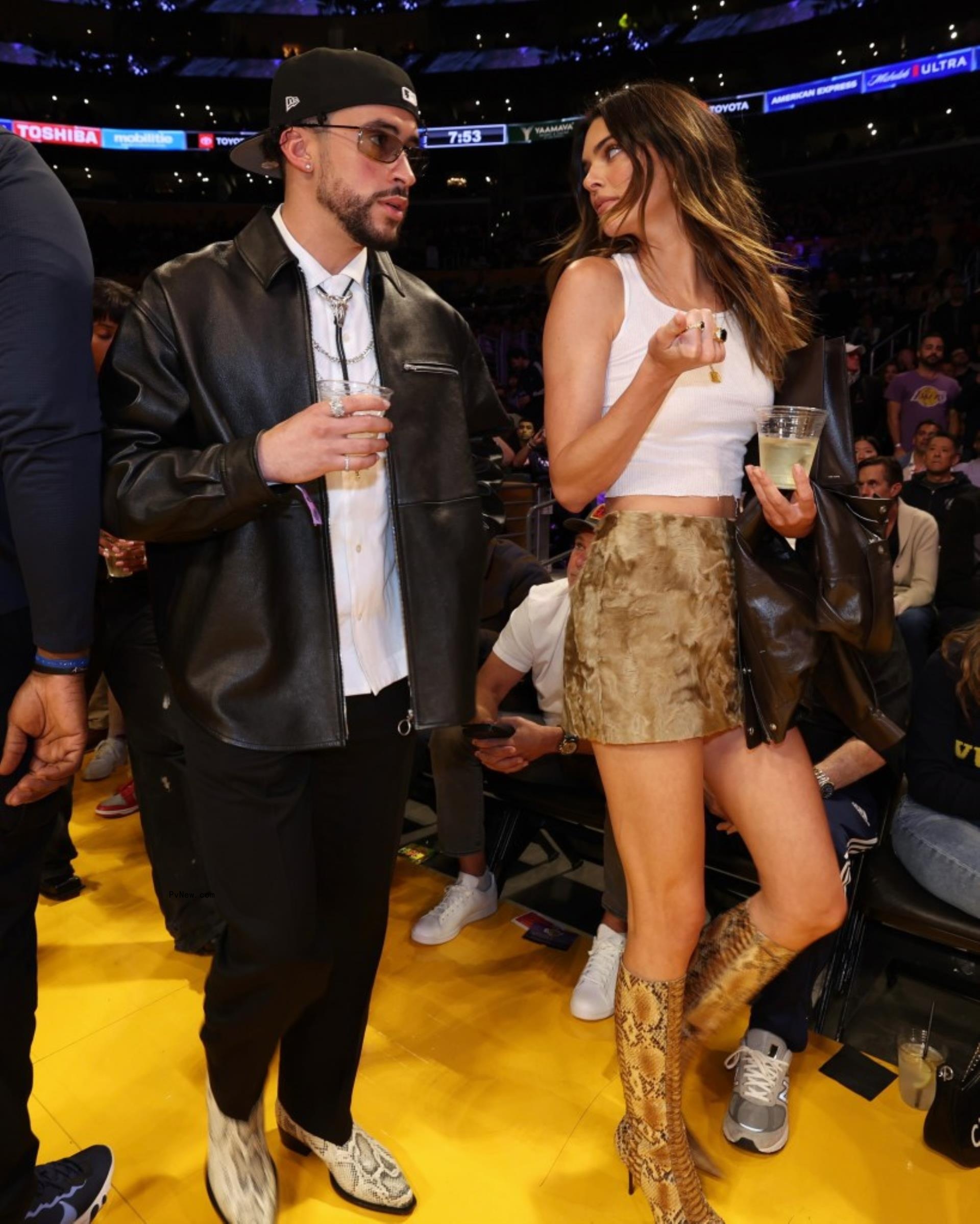 Bad bunny and Kendall Jenner at an NBA game.