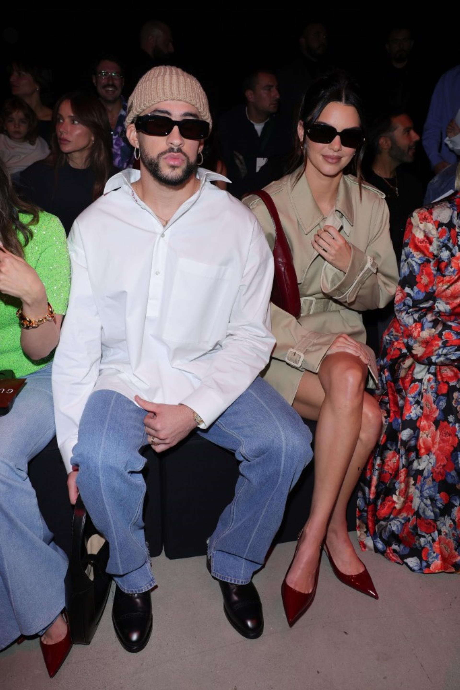 Bad bunny and Kendall Jenner at a fashion show in 2023.