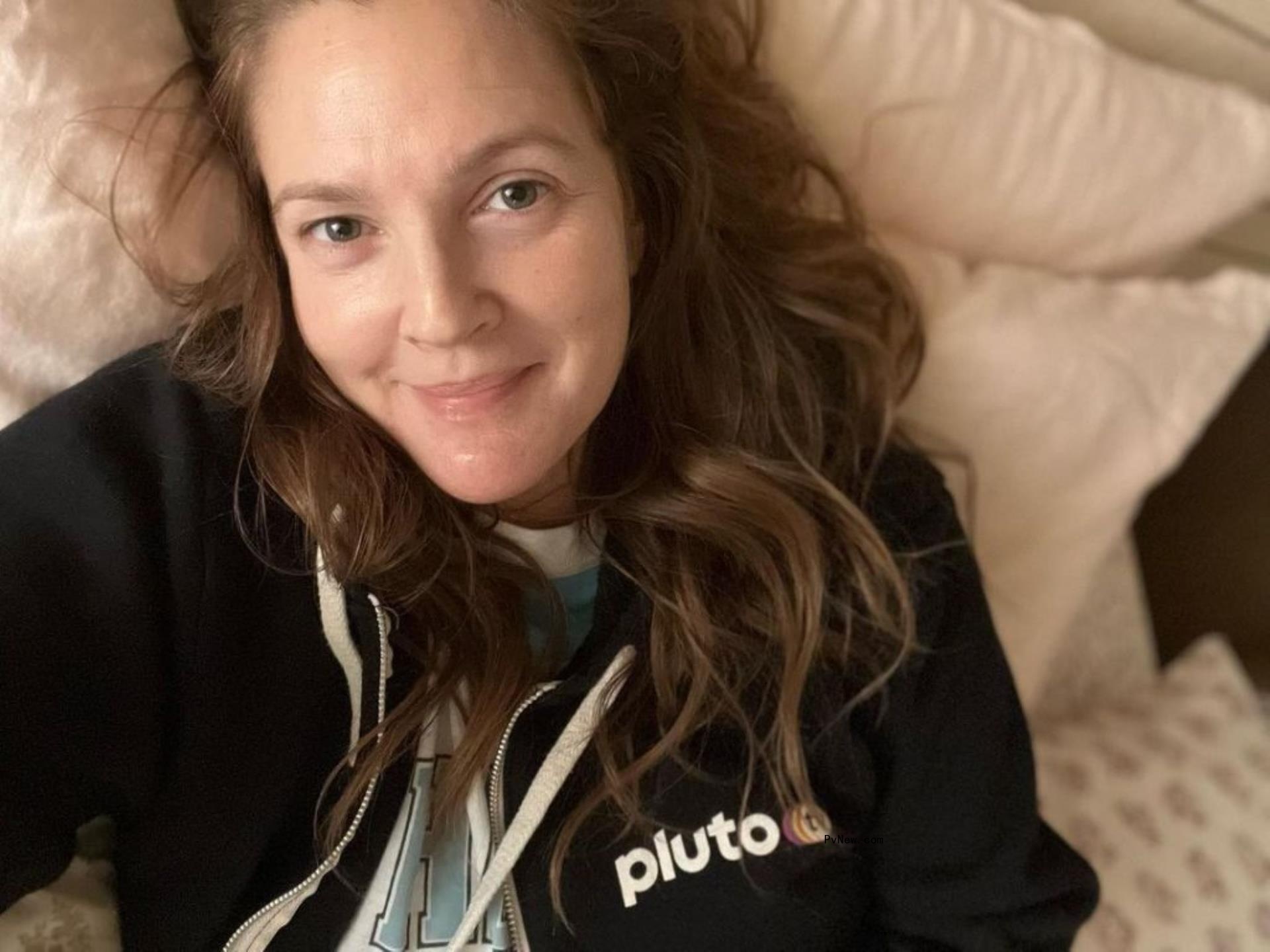 Drew Barrymore selfie in bed.