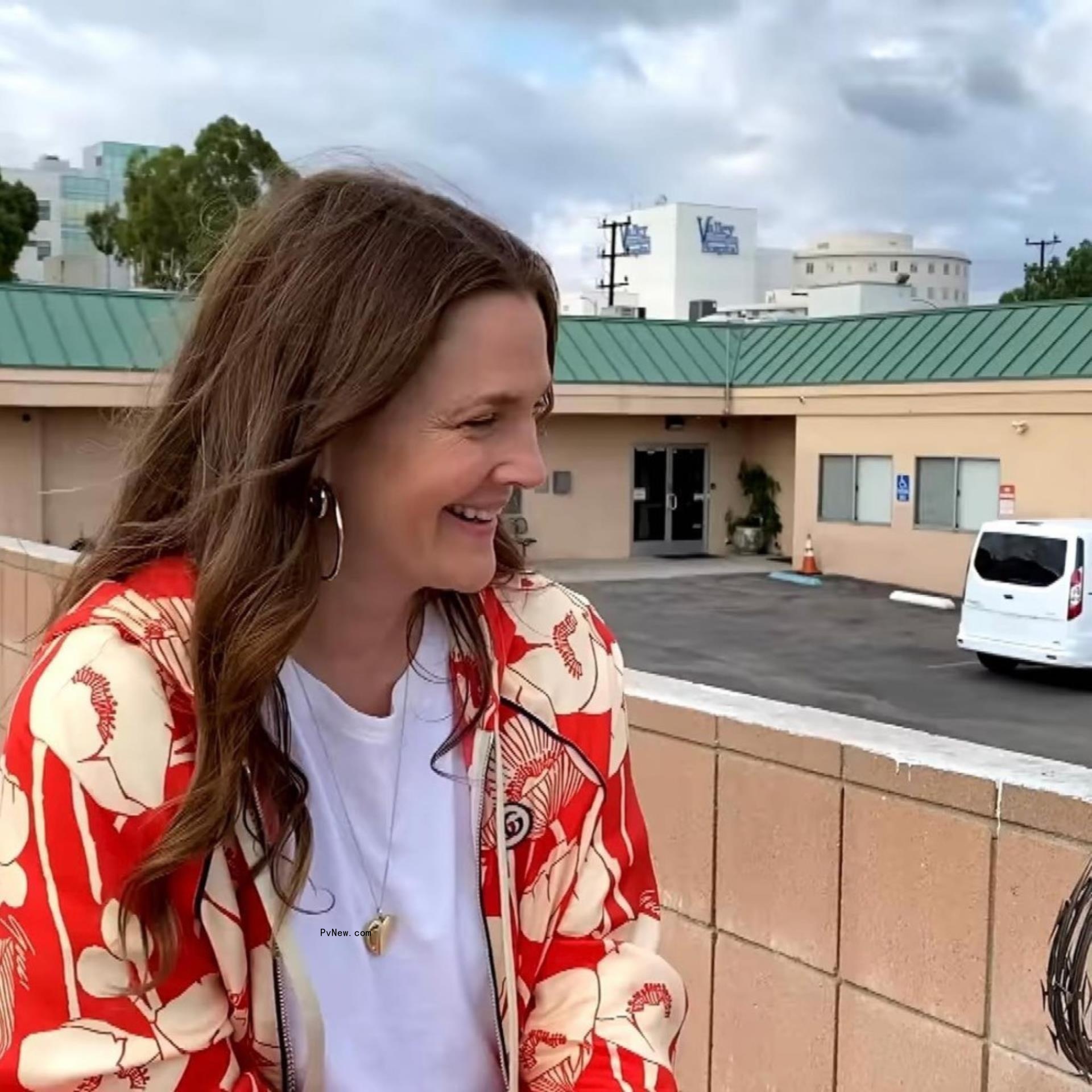 Drew Barrymore laughing and smiling 