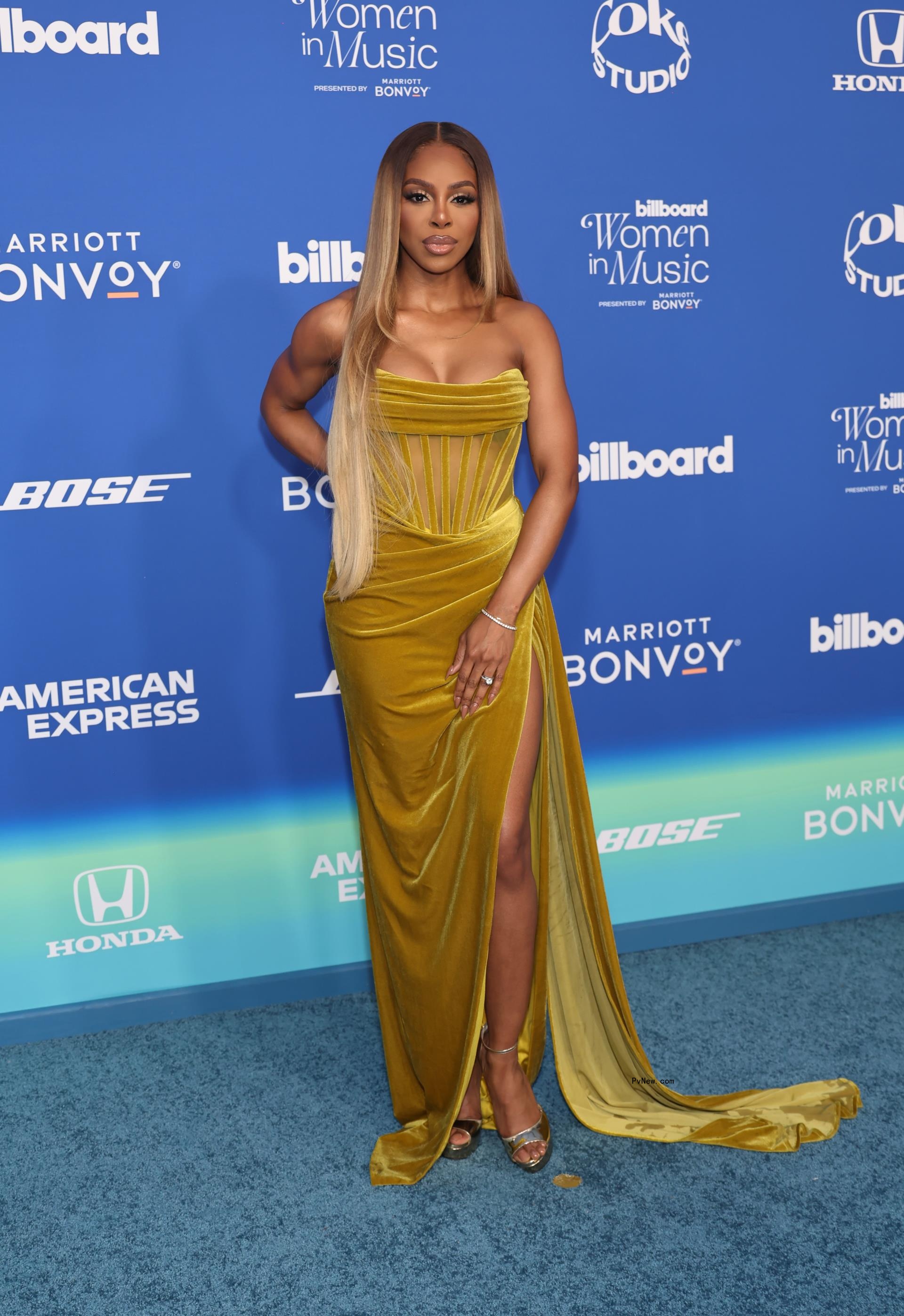 Candiace Dillard in a tan dress