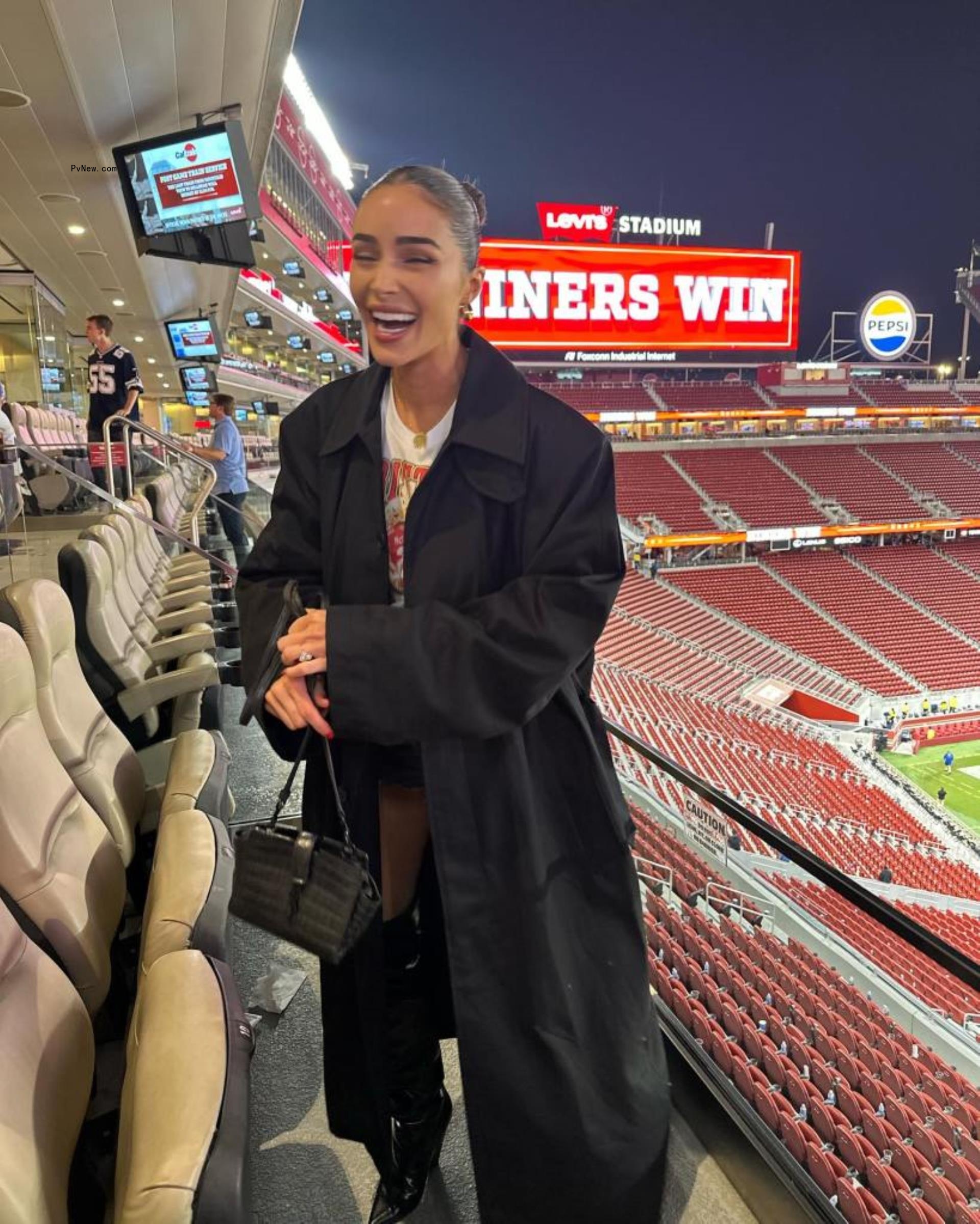 Olivia Culpo at a football game.