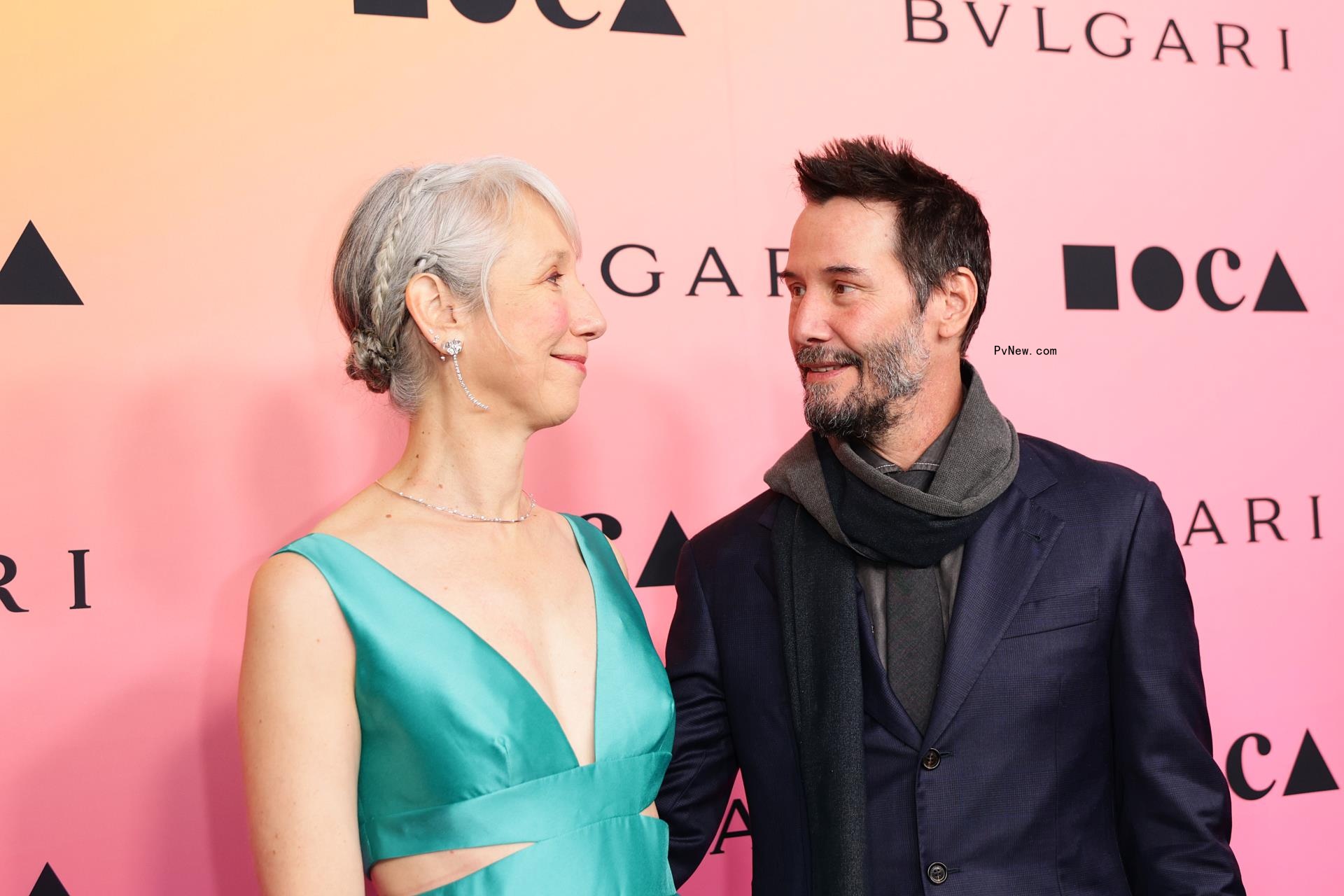 Alexandra Grant and Keanu Reeves posing together