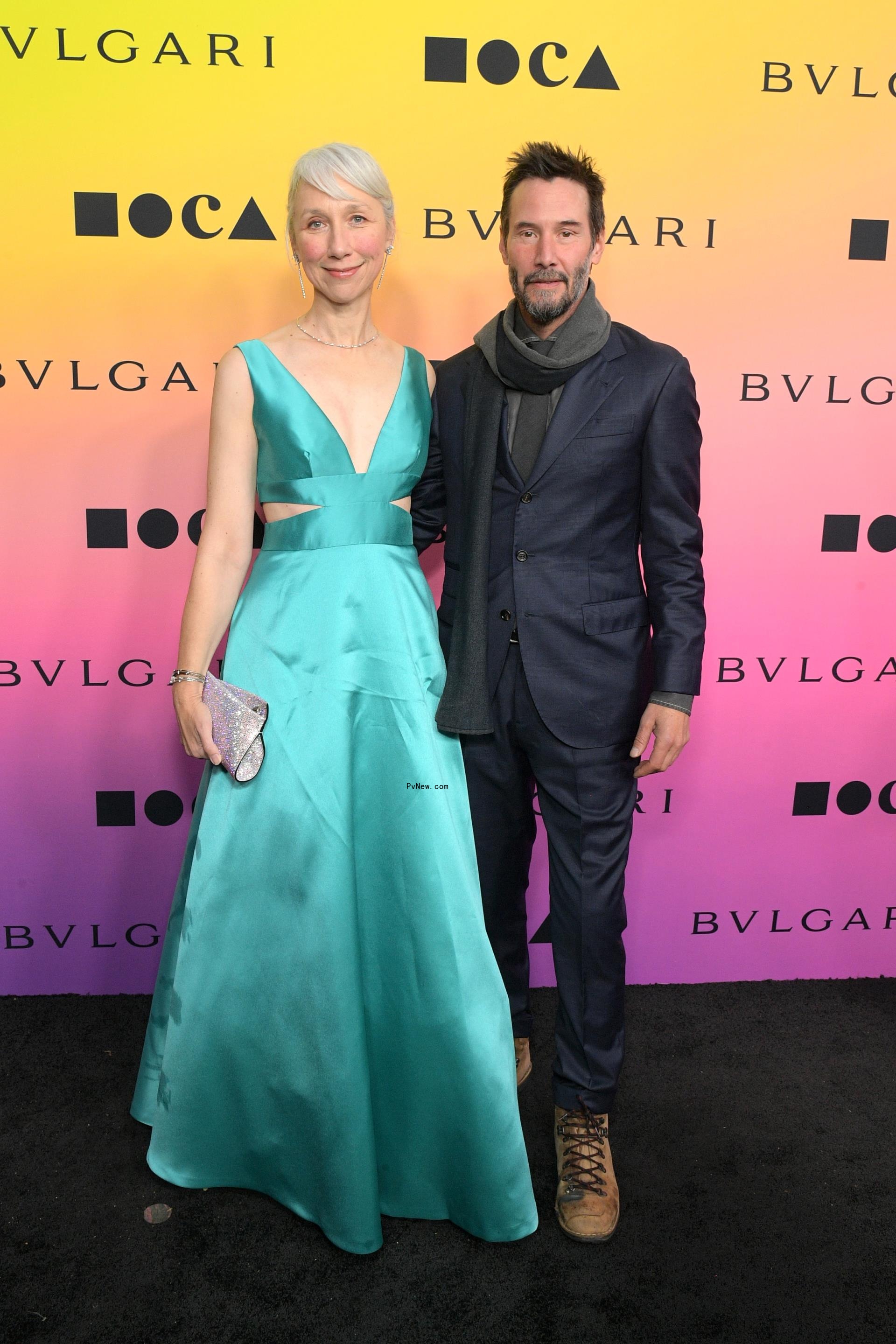 Alexandra Grant and Keanu Reeves posing together
