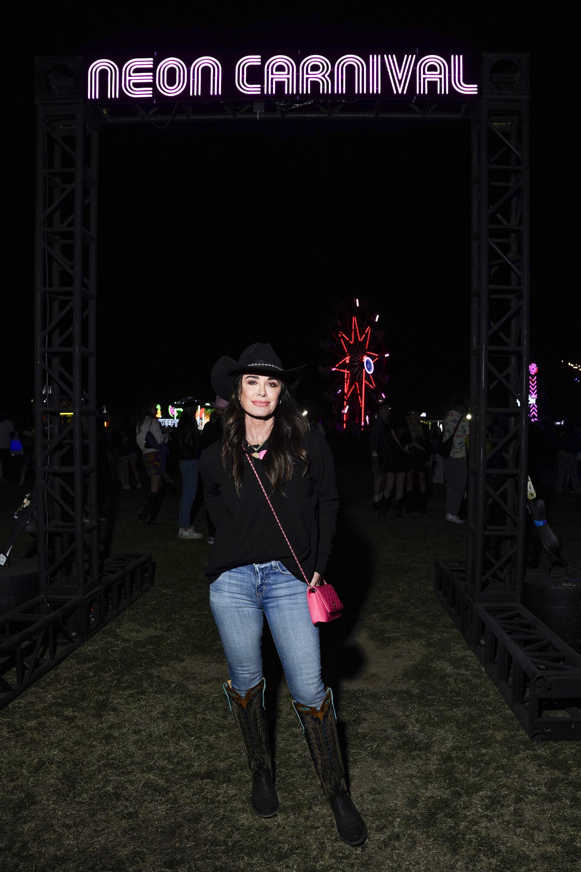 Kyle Richards posing at Coachella