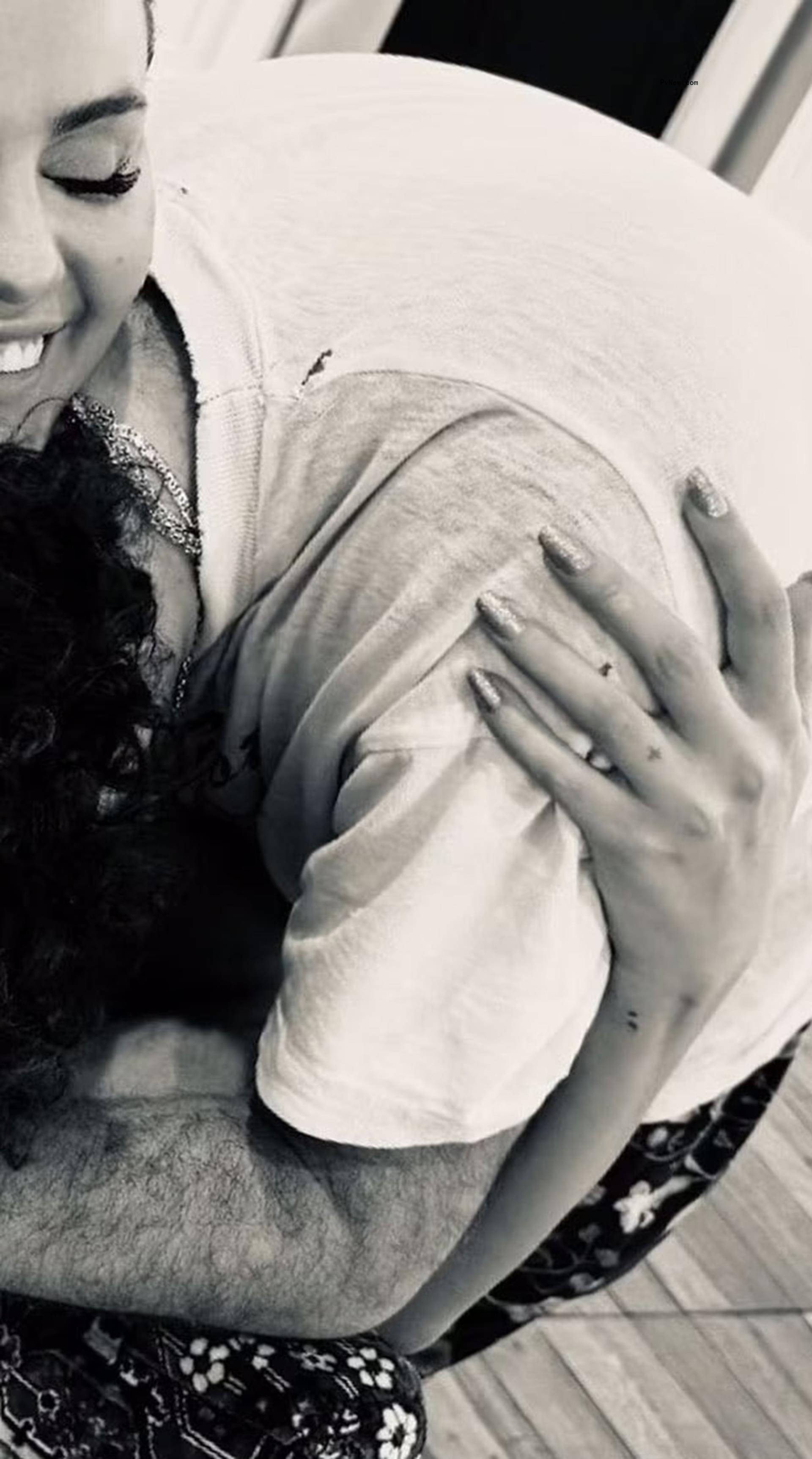 Selena Gomez and Benny Blanco cuddling