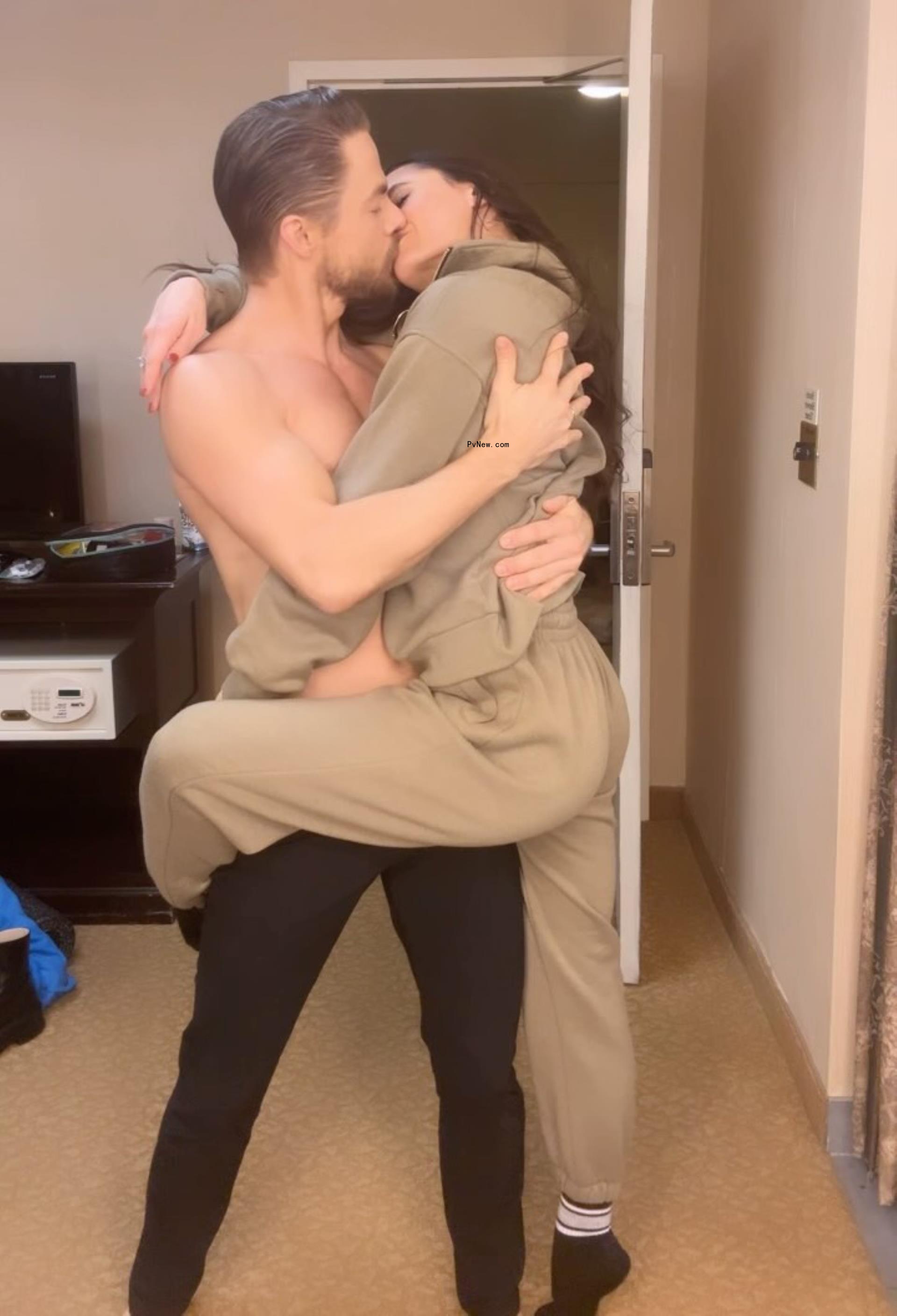 Derek Hough and Hayley Erbert kissing.