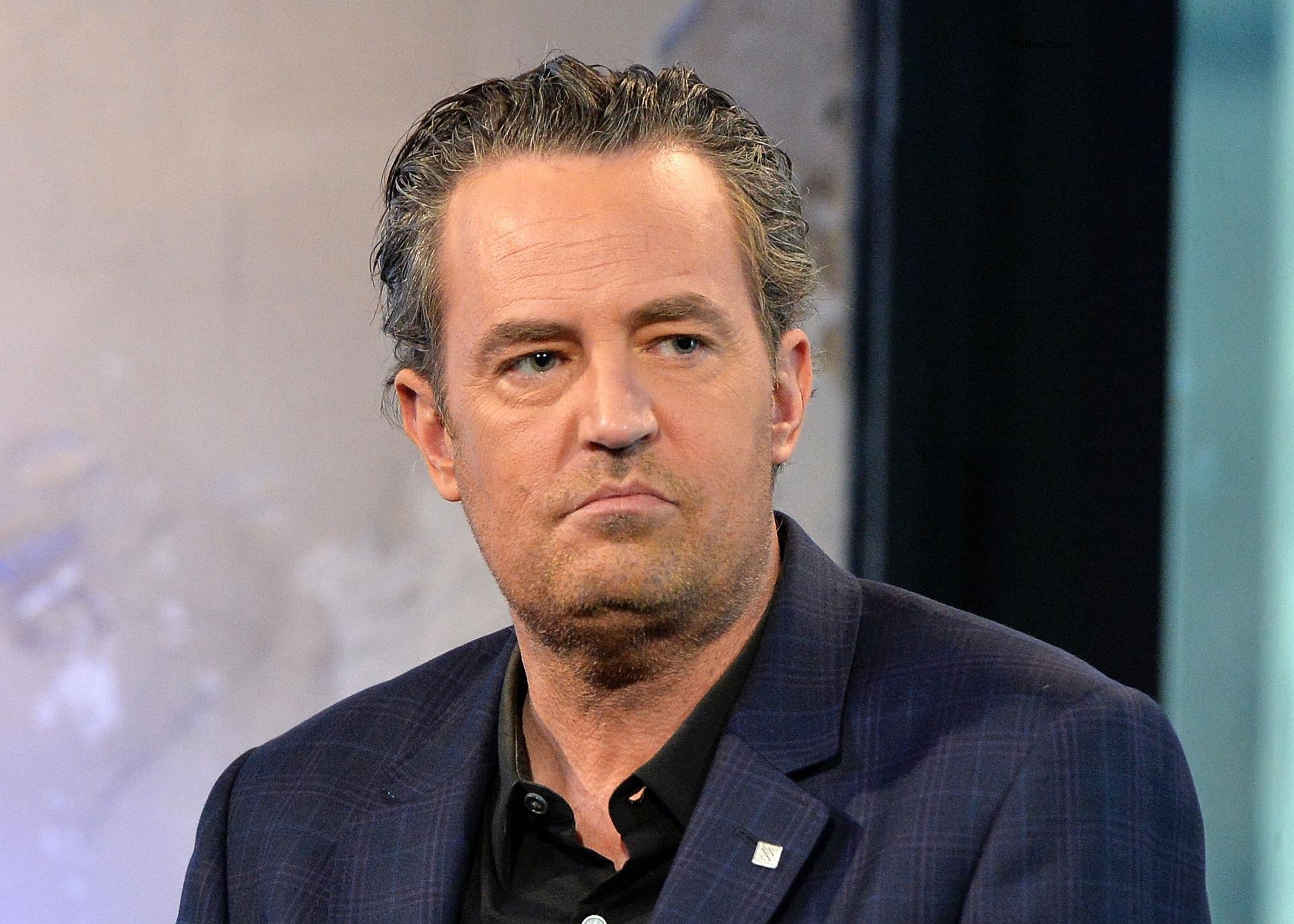 Matthew Perry frowning