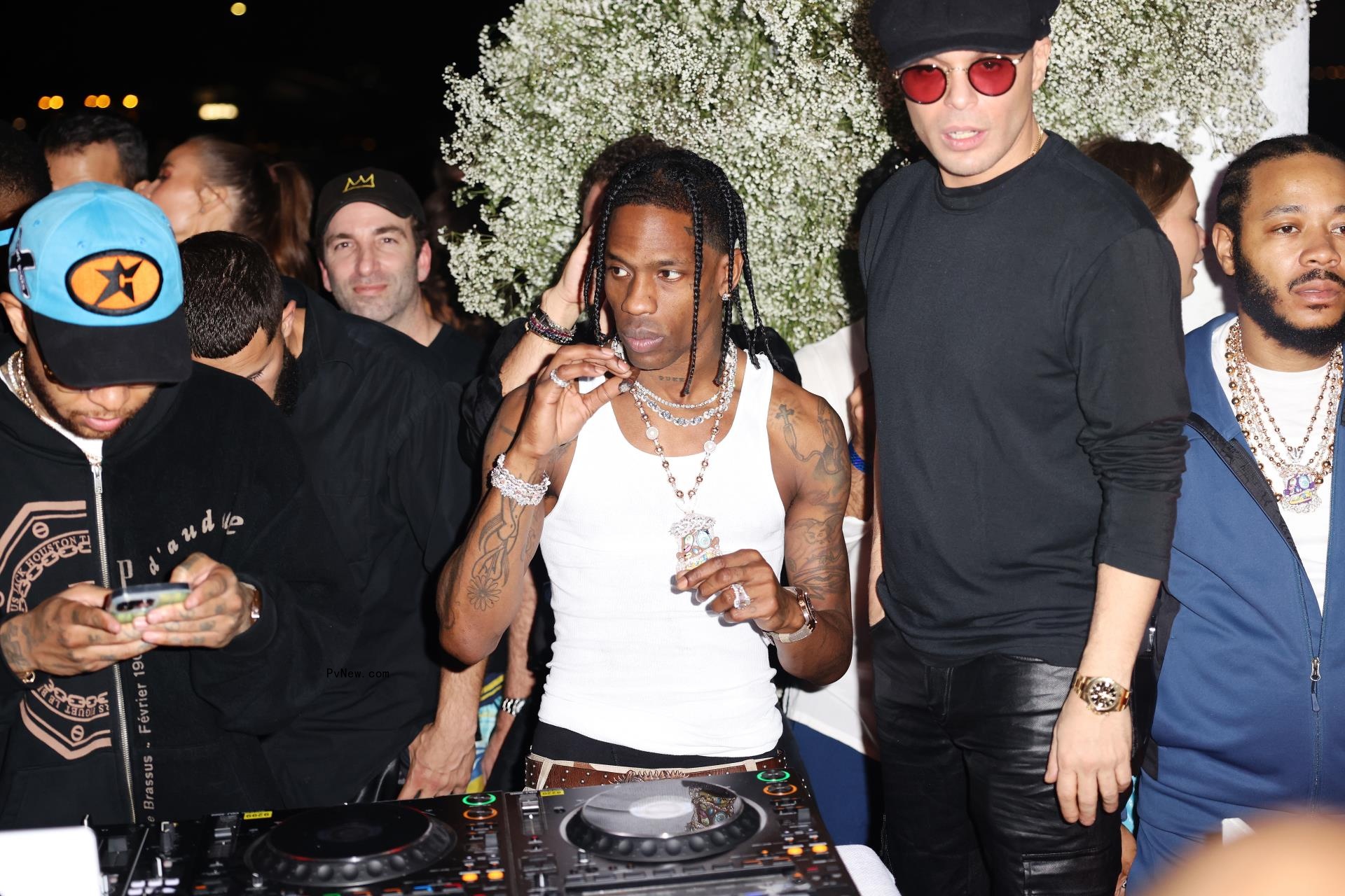 Travis Scott at a party.