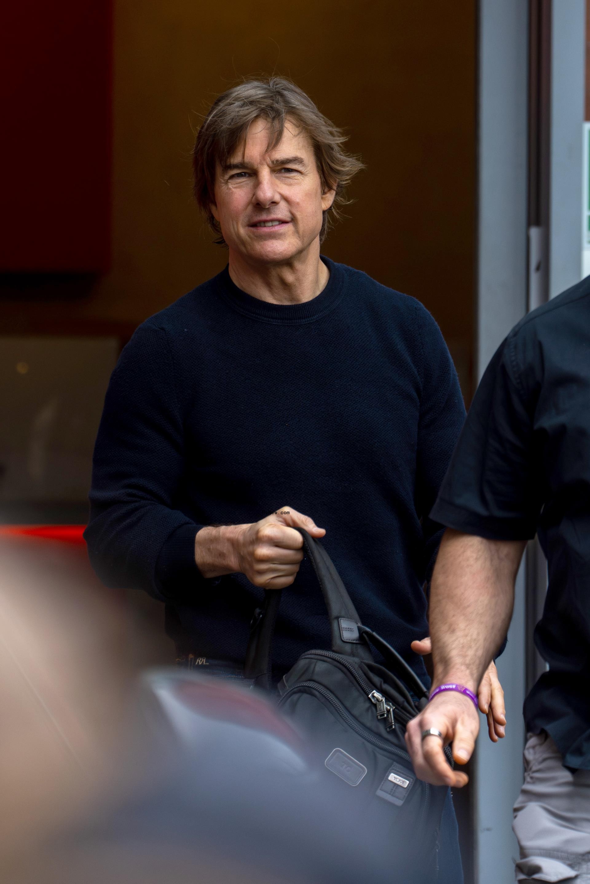 Tom Cruise smiling in London.