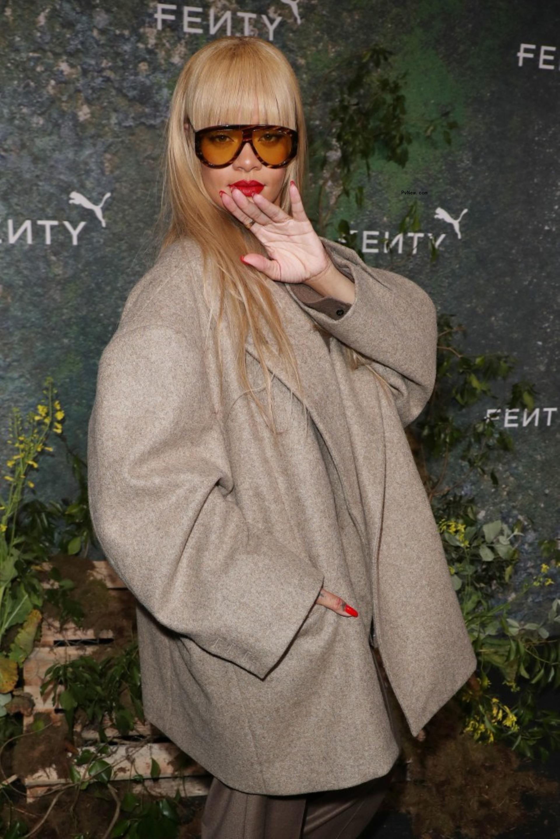 Rihanna posing at a FENTY x PUMA event