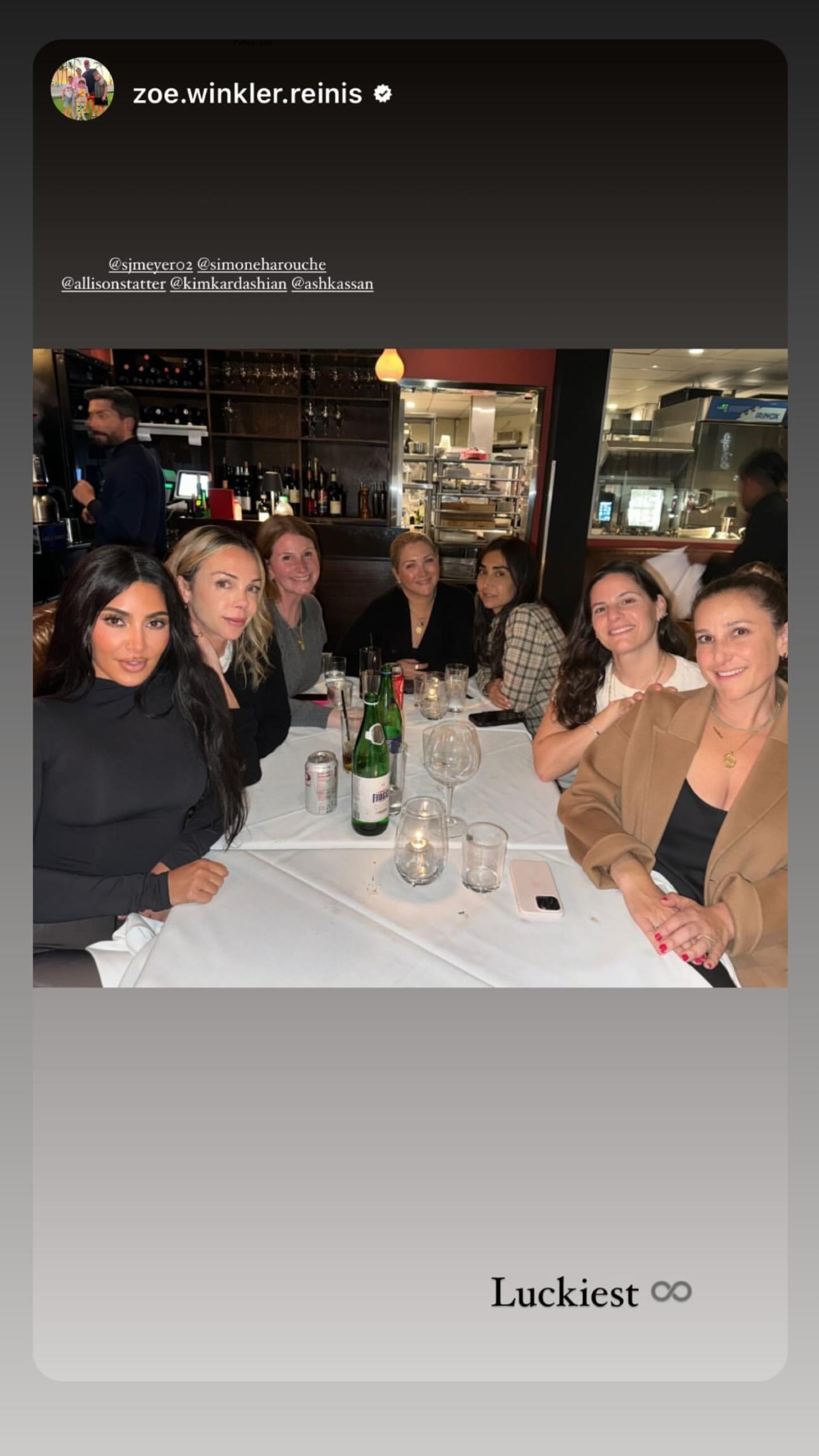 Kim Kardashian out to eat with friends.