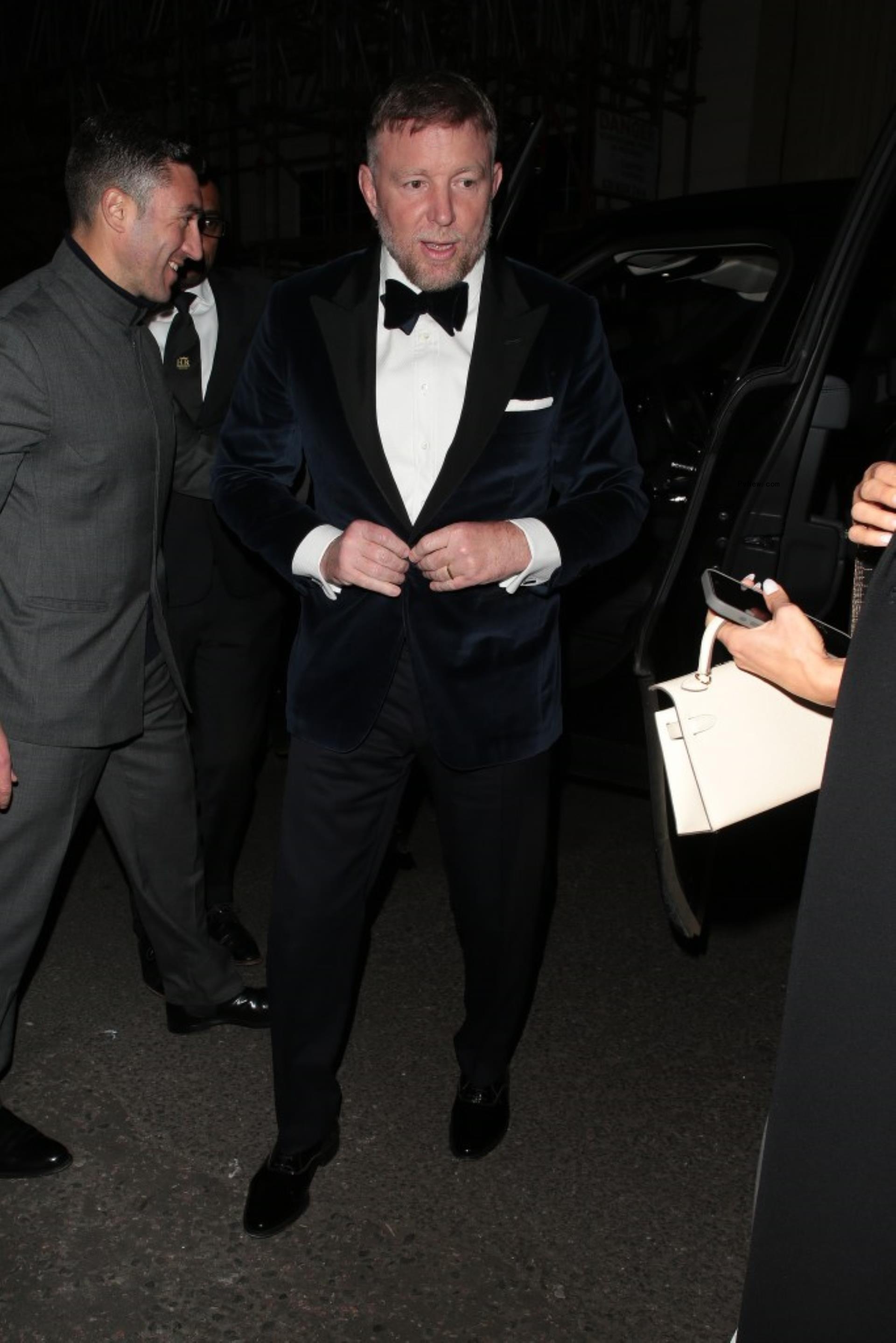 Guy Ritchie arriving at Victoria Beckham's 50th birthday party